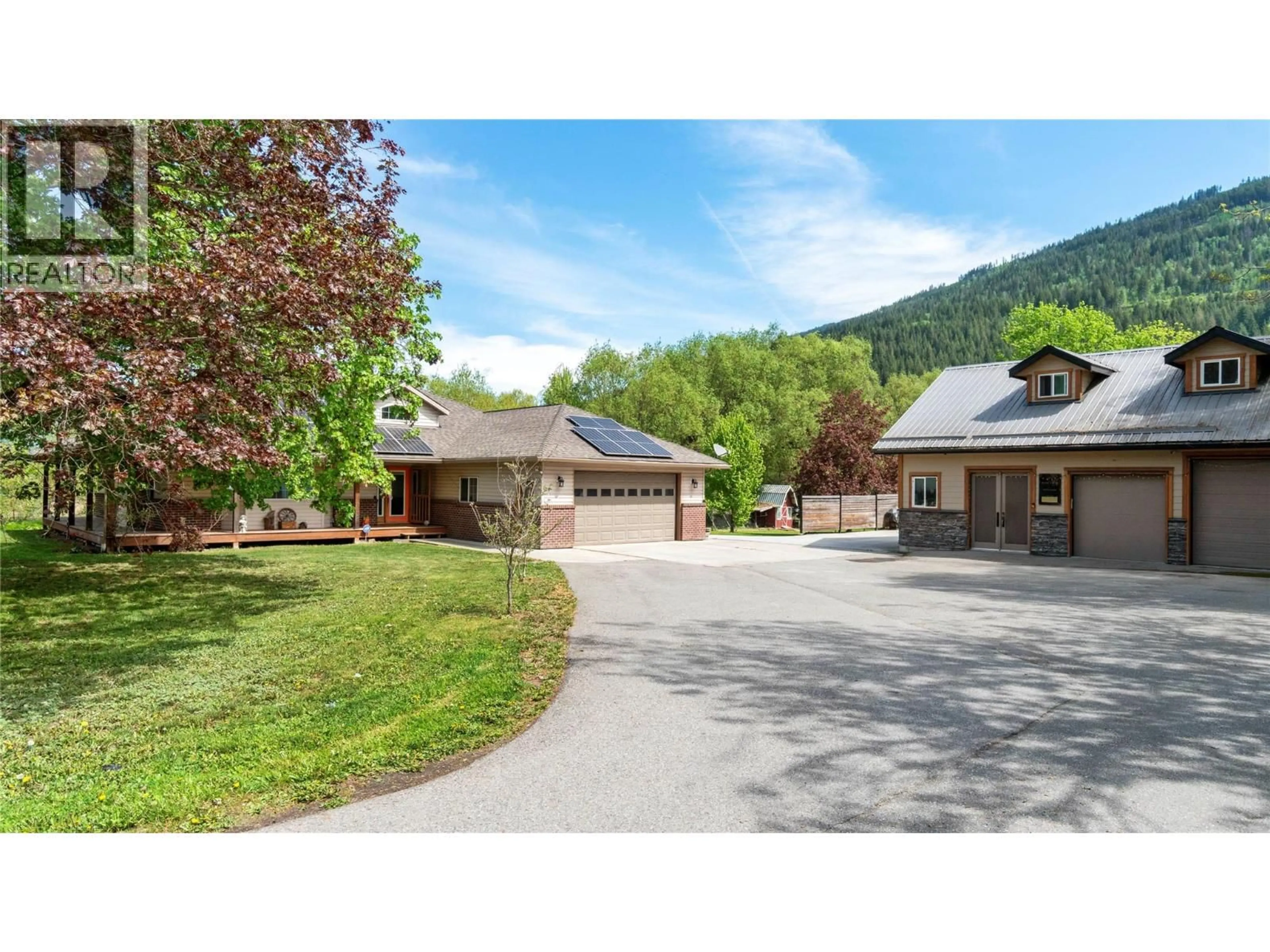 A pic from outside/outdoor area/front of a property/back of a property/a pic from drone, mountain view for 3960 50 STREET NORTHEAST, Salmon Arm British Columbia V1E1Y5