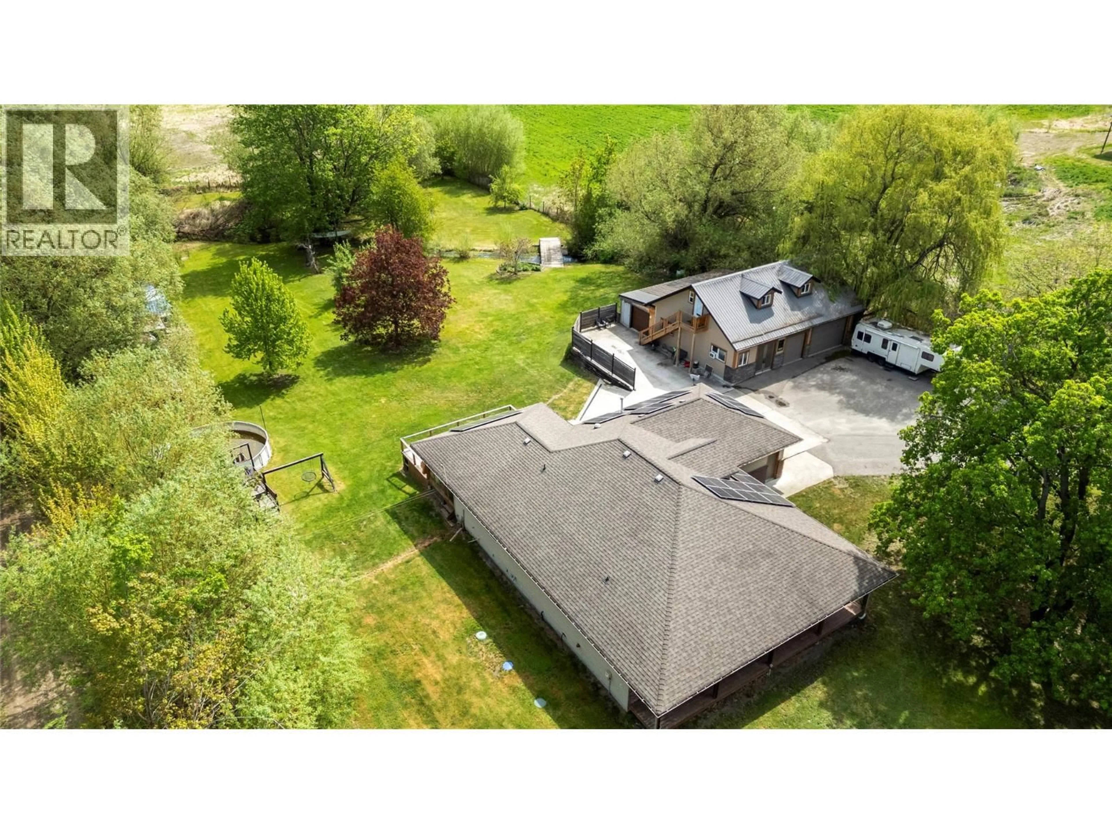 A pic from outside/outdoor area/front of a property/back of a property/a pic from drone, unknown for 3960 50 STREET NORTHEAST, Salmon Arm British Columbia V1E1Y5