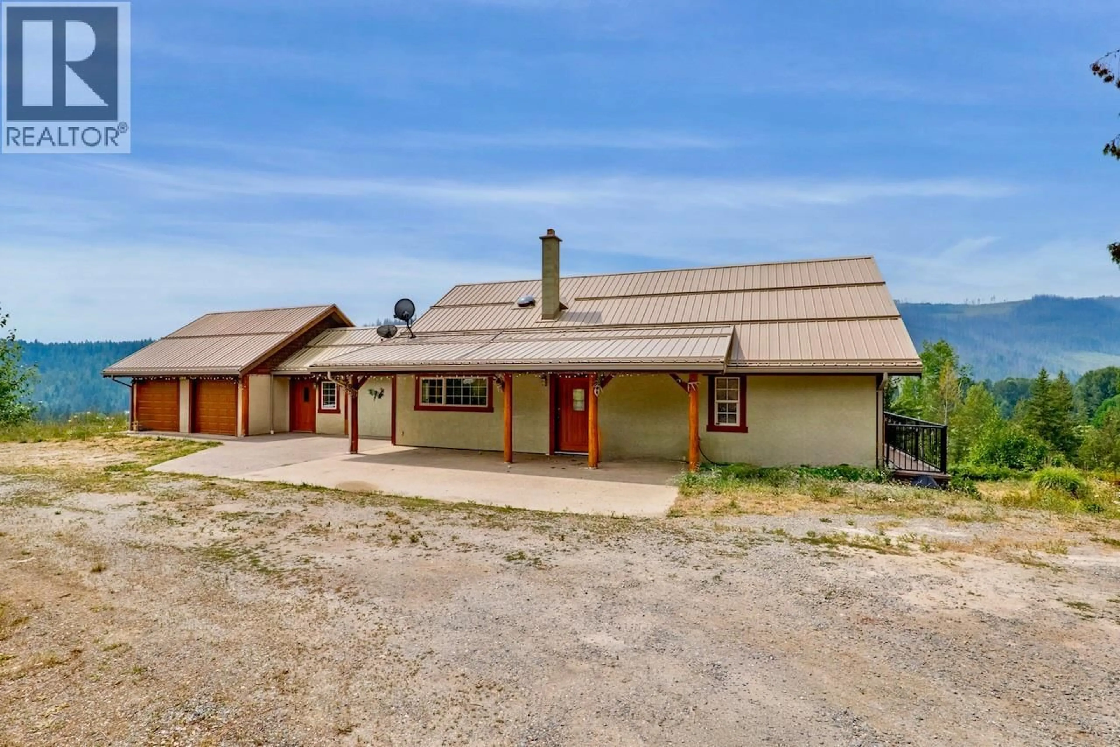 A pic from outside/outdoor area/front of a property/back of a property/a pic from drone, street for 4875 MEADOW CREEK ROAD, Celista British Columbia V0E1M6