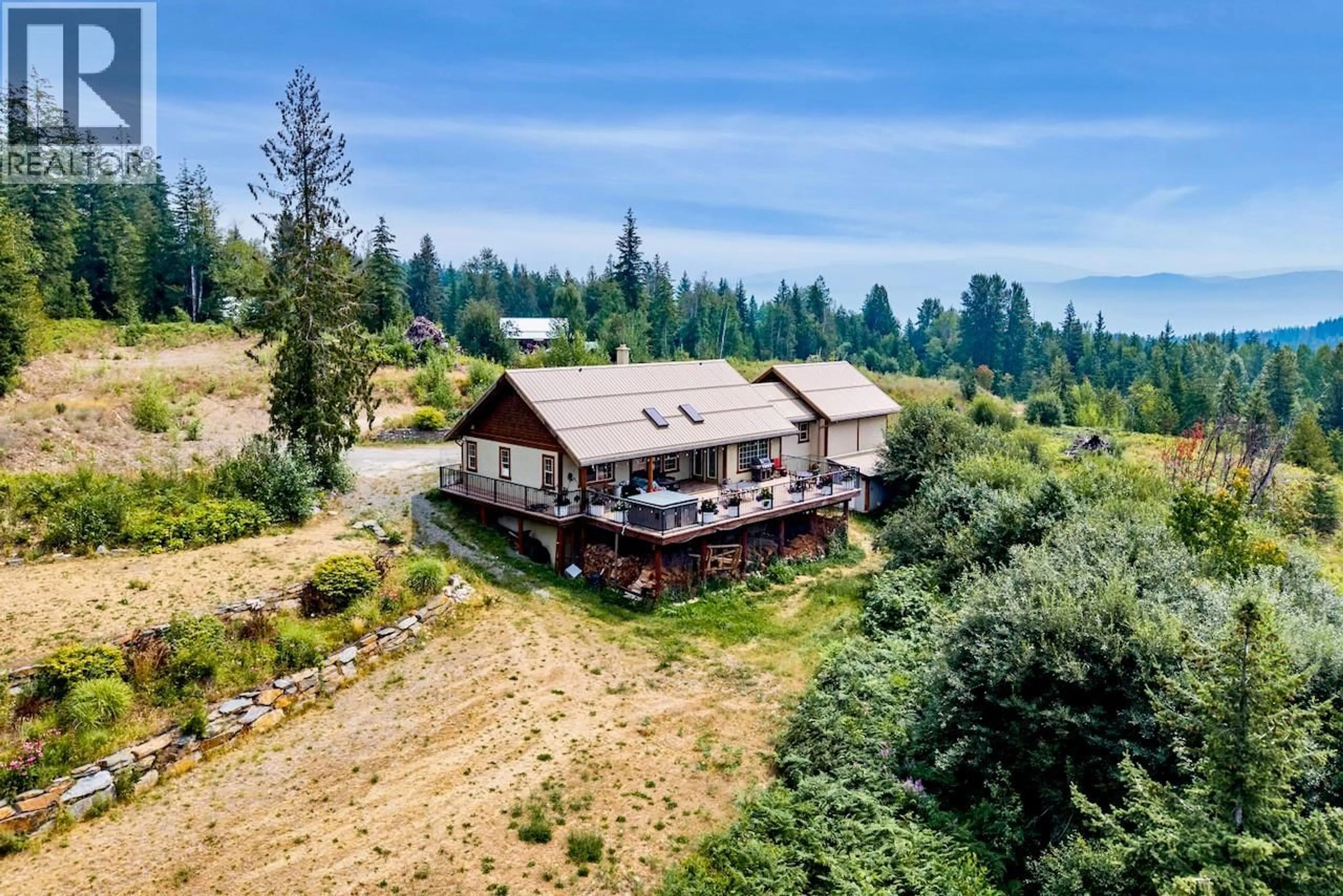 A pic from outside/outdoor area/front of a property/back of a property/a pic from drone, mountain view for 4875 MEADOW CREEK ROAD, Celista British Columbia V0E1M6