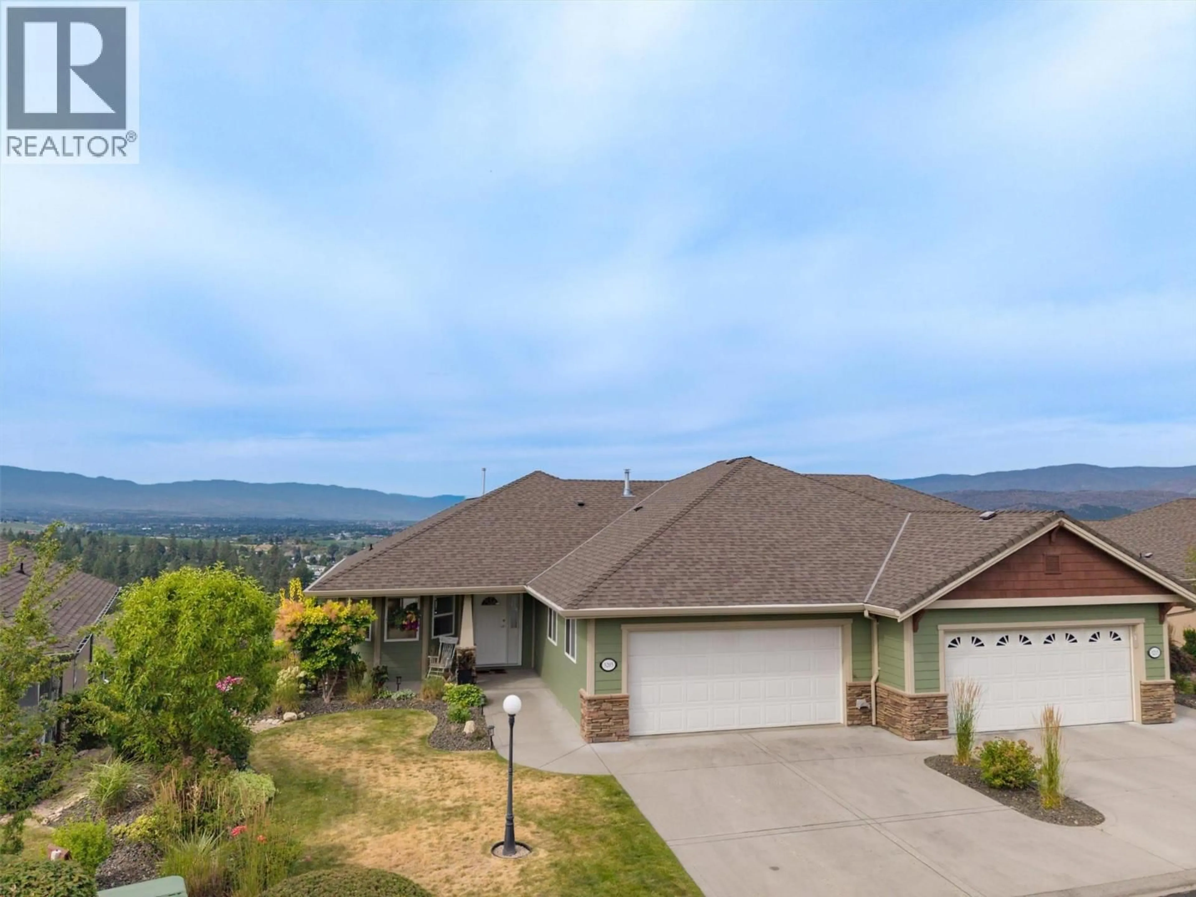 A pic from outside/outdoor area/front of a property/back of a property/a pic from drone, mountain view for 5205 SANDHILLS DRIVE, Kelowna British Columbia V1X7Y7
