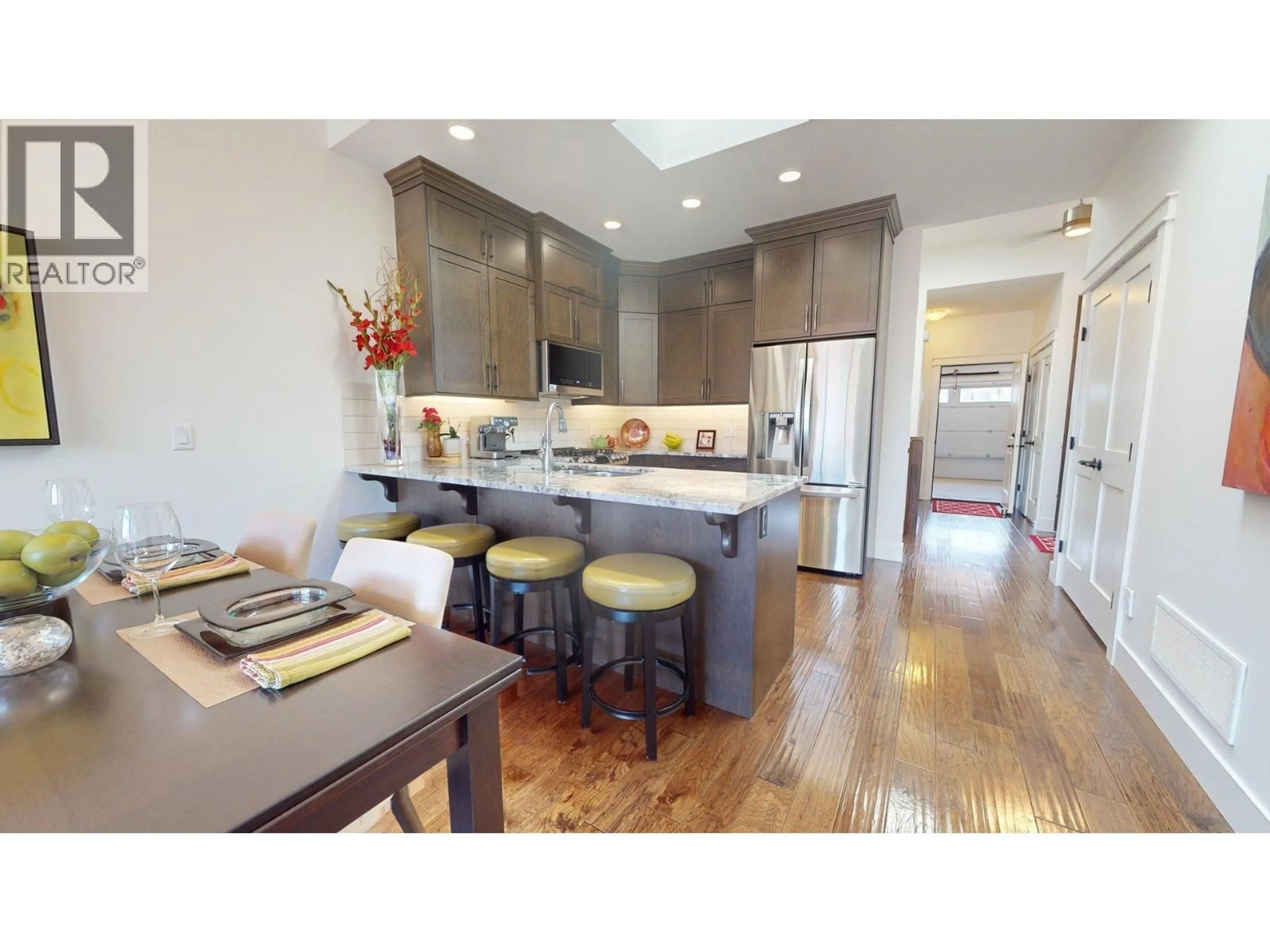 Open concept kitchen, wood/laminate floor for 1696 LAKE VISTA ROAD, Kelowna British Columbia V1Z4E1