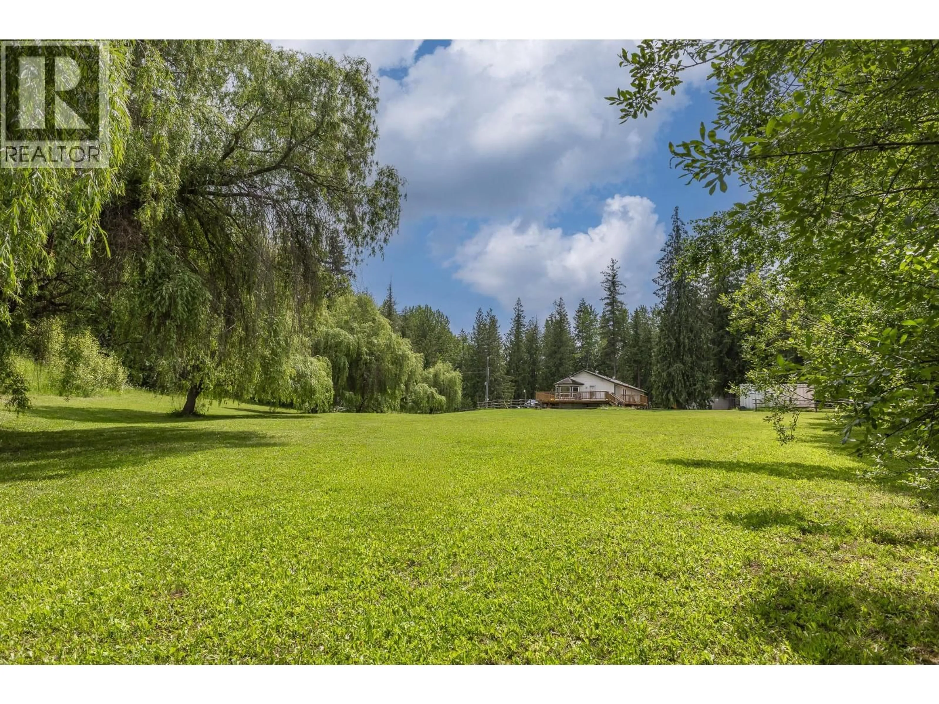 A pic from outside/outdoor area/front of a property/back of a property/a pic from drone, forest/trees view for 5060 TATLOW ROAD, Salmon Arm British Columbia V1E2P8