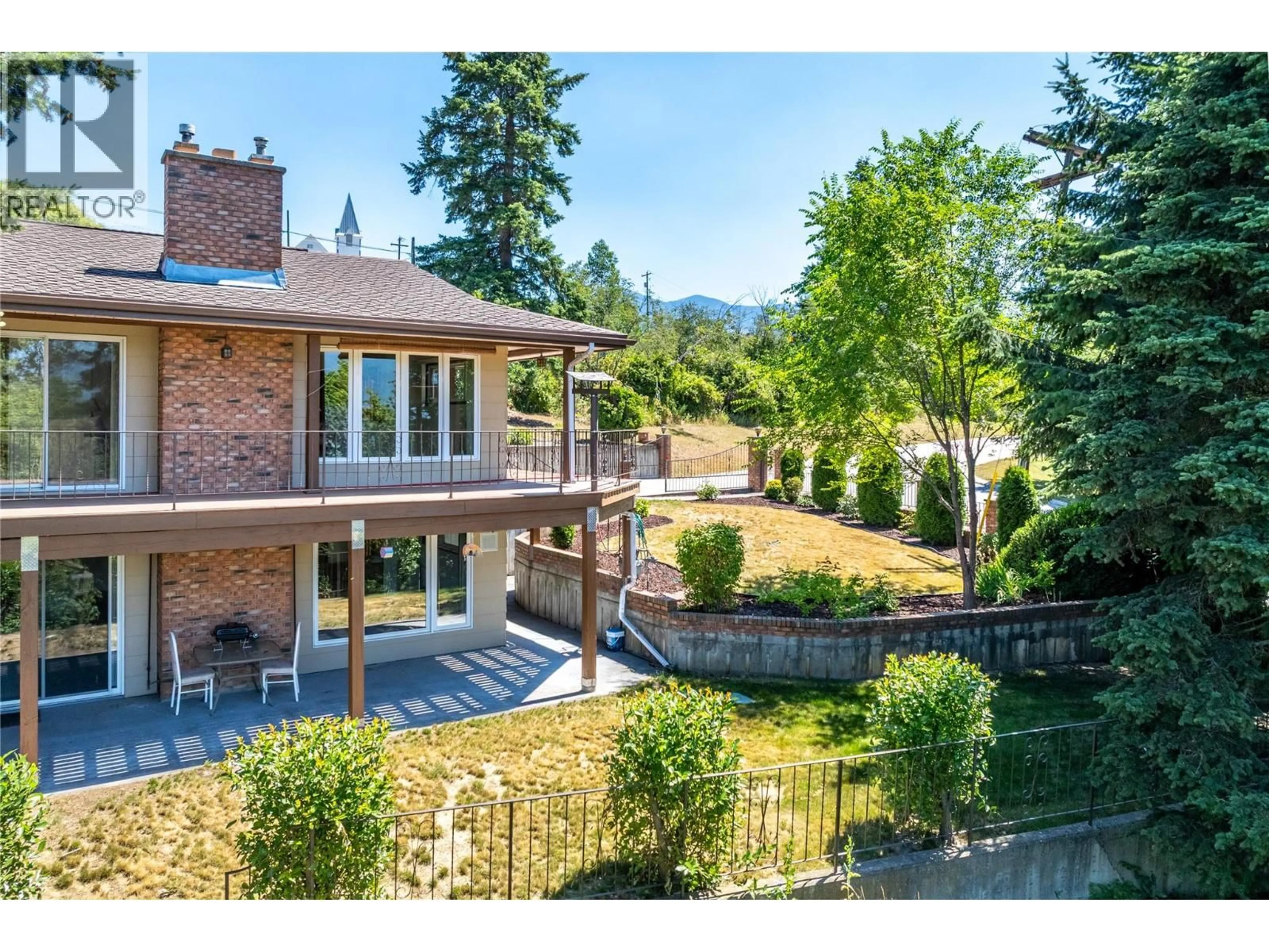 A pic from outside/outdoor area/front of a property/back of a property/a pic from drone, mountain view for 614 VANCOUVER N STREET, Creston British Columbia V0B1G2