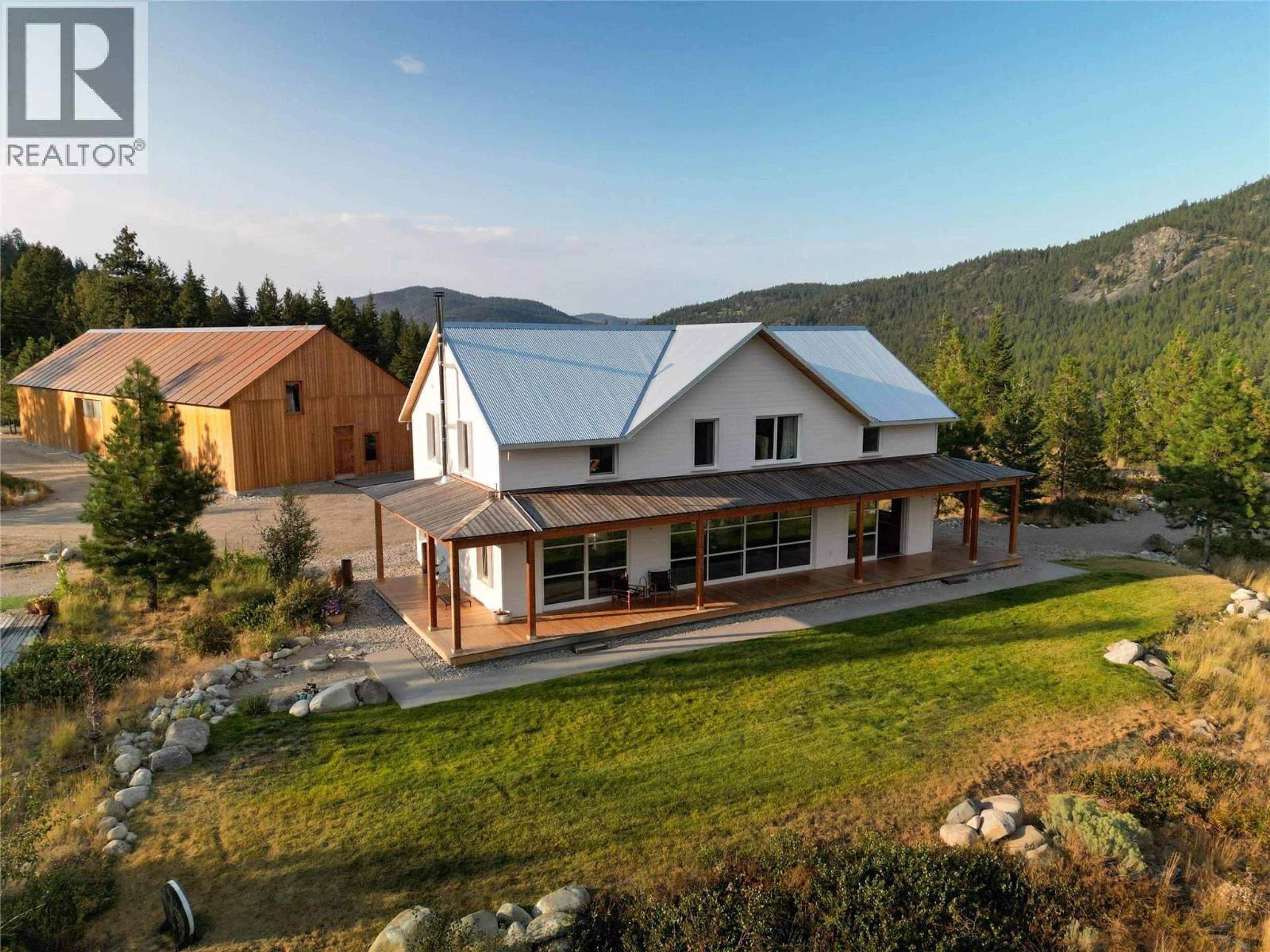 A pic from outside/outdoor area/front of a property/back of a property/a pic from drone, mountain view for 8025 PRINCETON-SUMMERLAND ROAD, Summerland British Columbia V0H1Z8