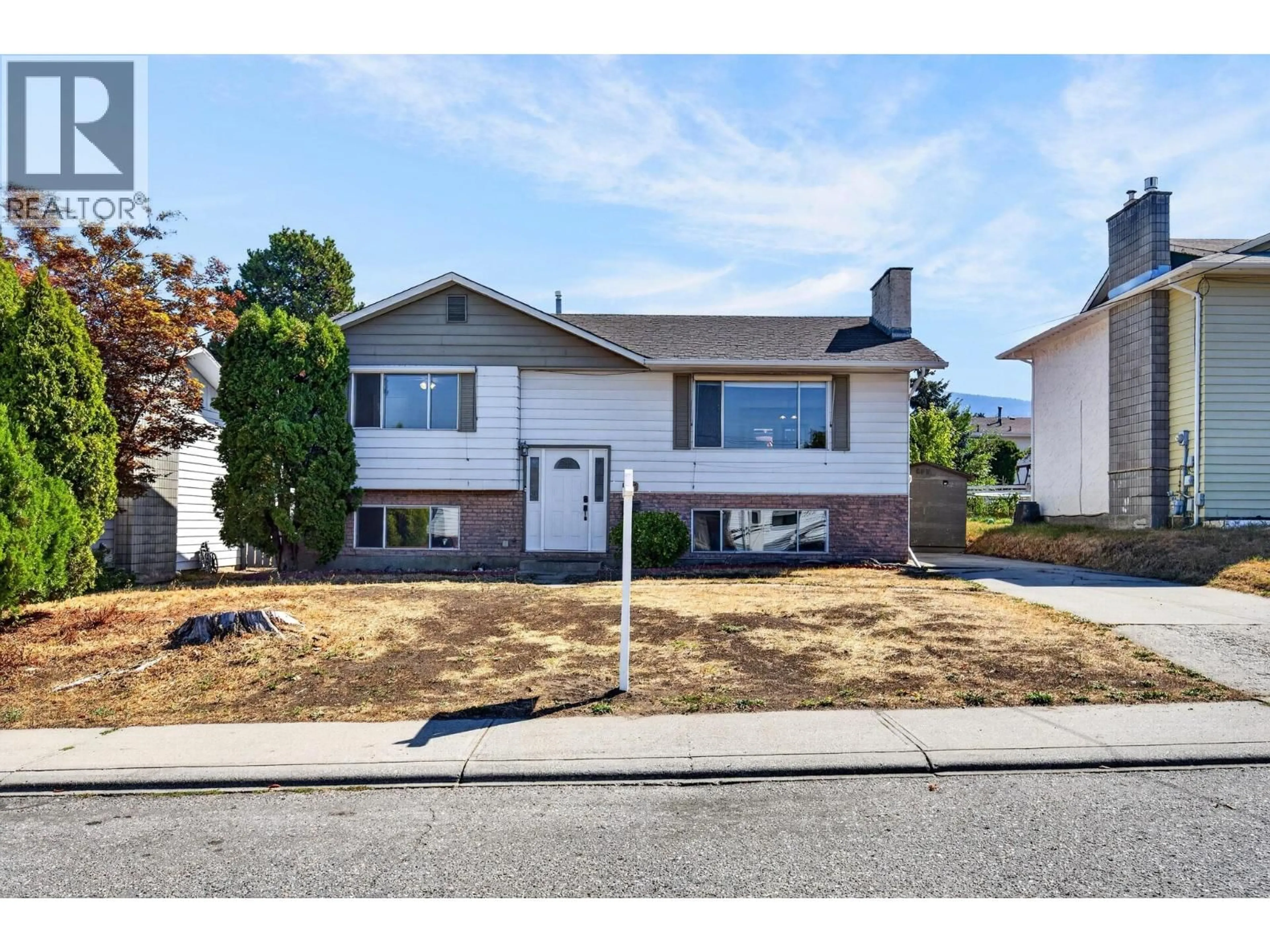 Home with vinyl exterior material, street for 3907 14 STREET, Vernon British Columbia V1T7N3