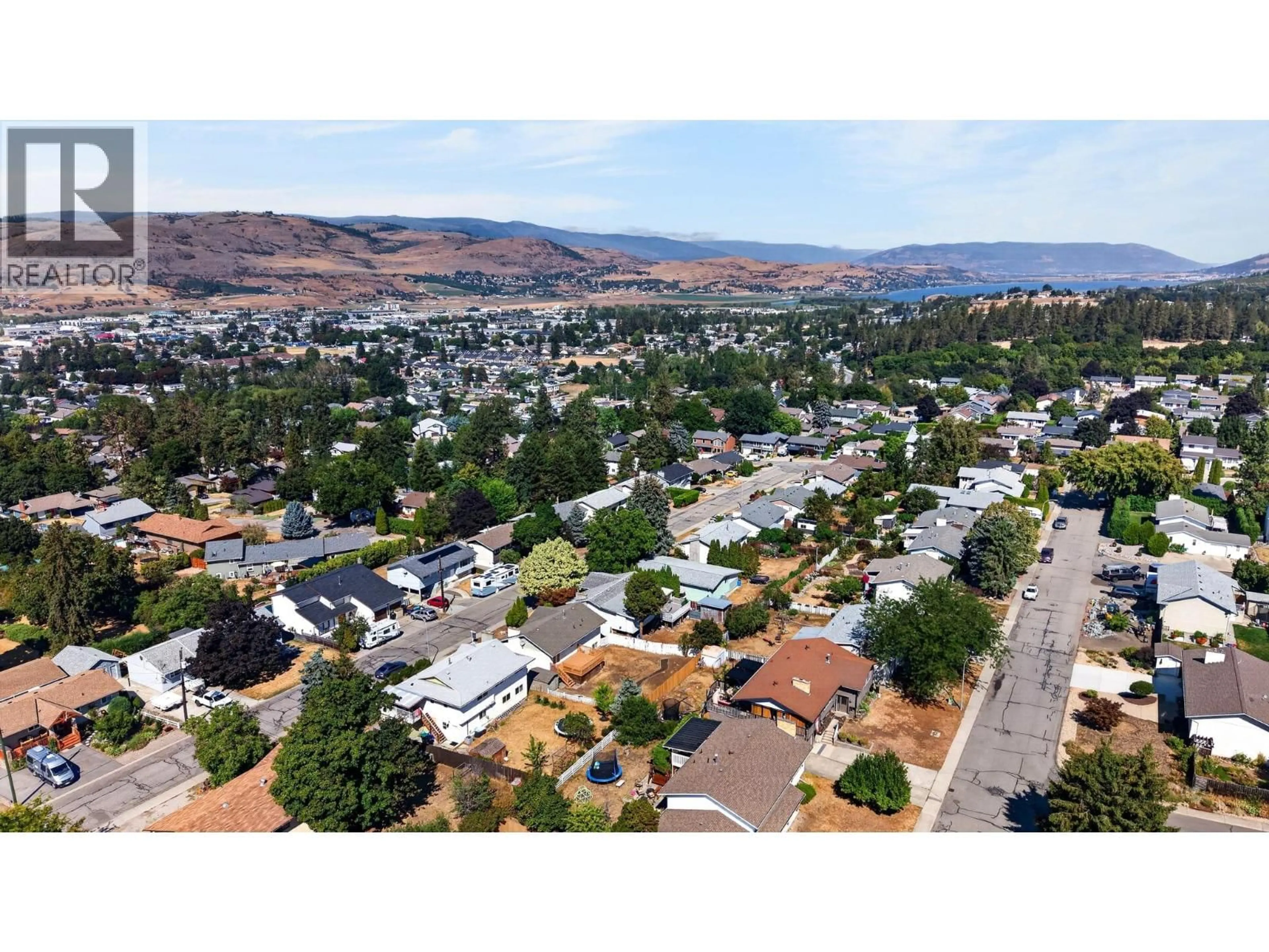 A pic from outside/outdoor area/front of a property/back of a property/a pic from drone, mountain view for 3907 14 STREET, Vernon British Columbia V1T7N3
