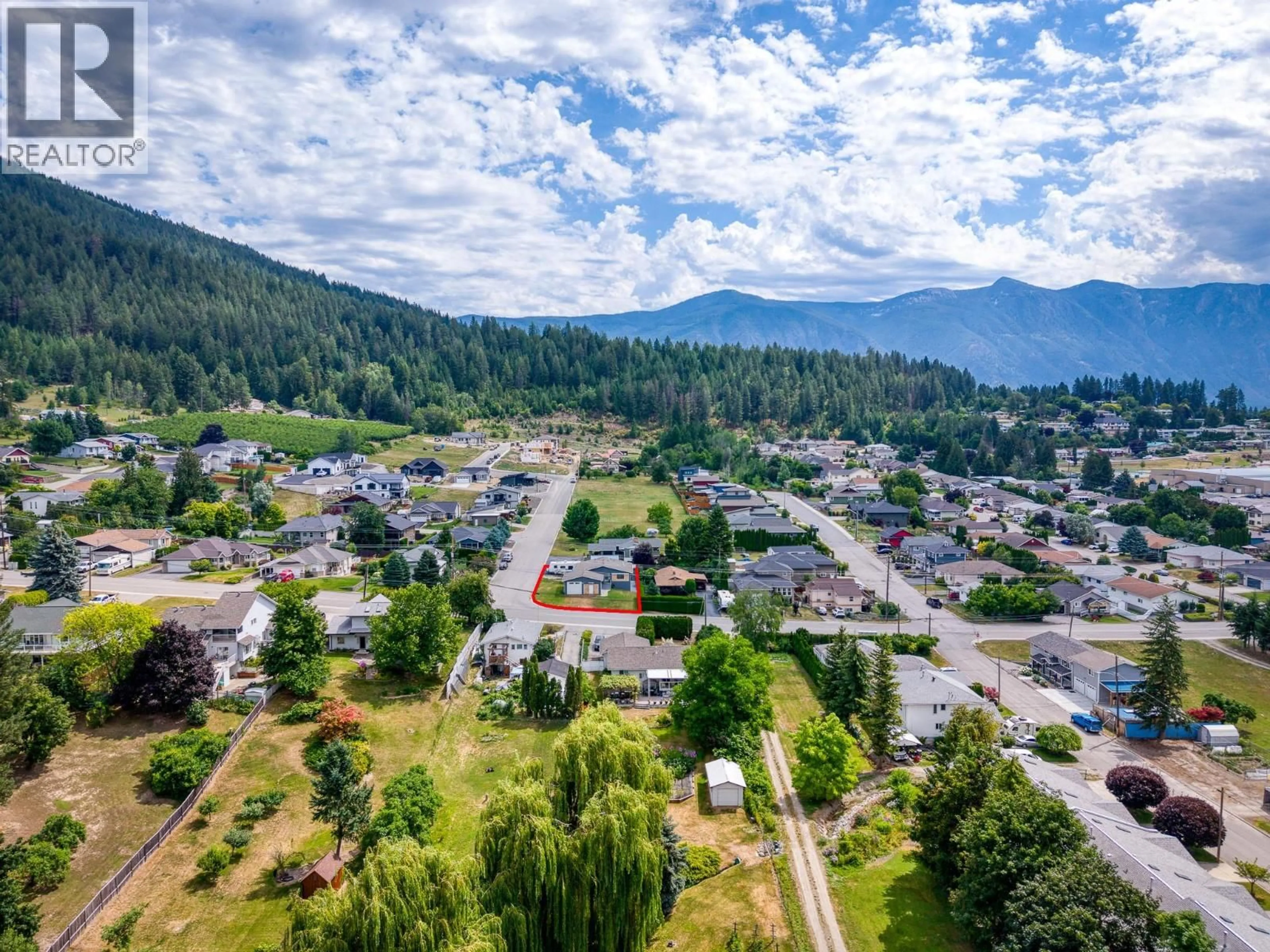 A pic from outside/outdoor area/front of a property/back of a property/a pic from drone, mountain view for 614 16TH AVENUE NORTH, Creston British Columbia V0B1G5