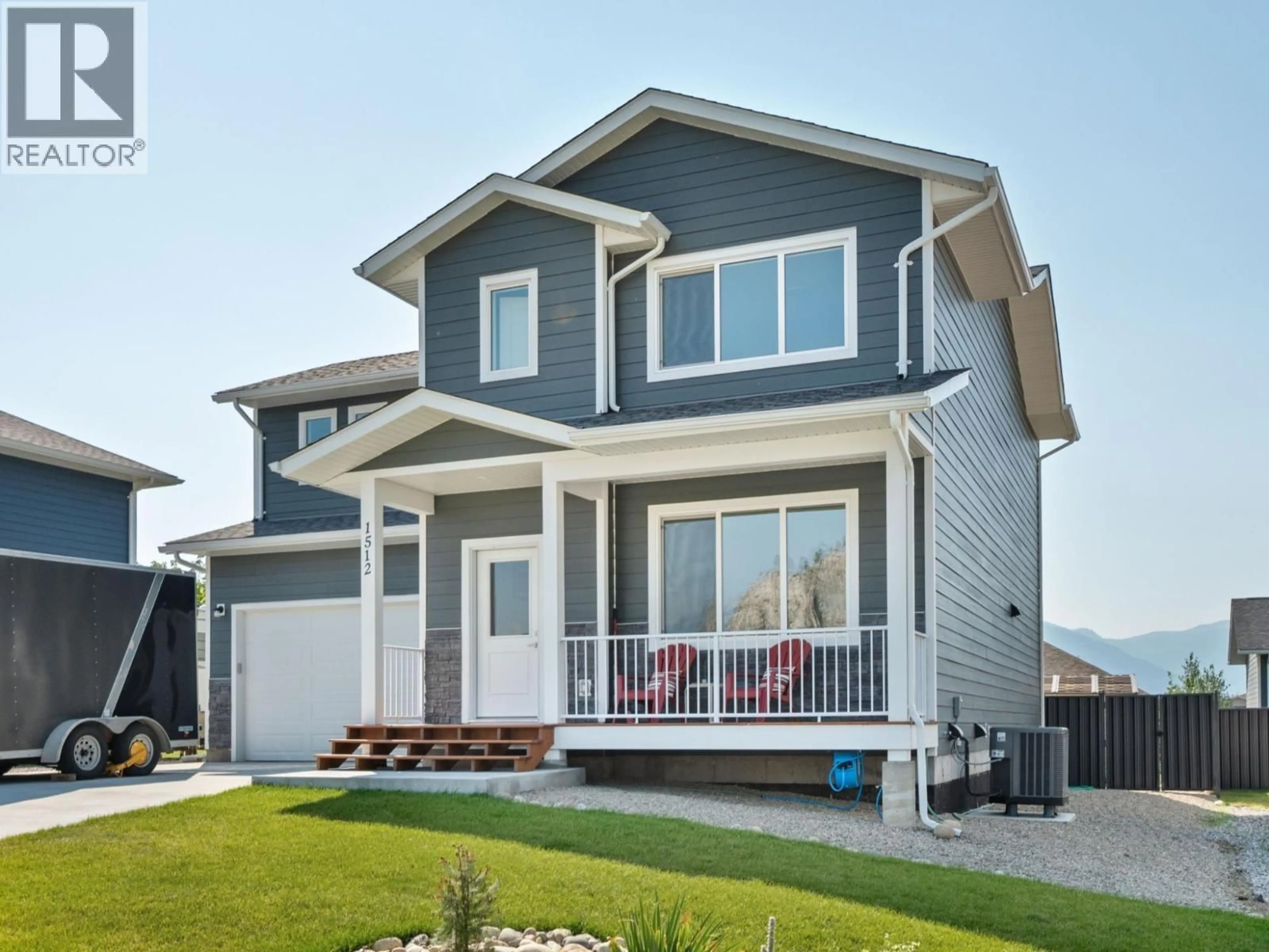 Home with vinyl exterior material, street for 1512 ASPEN LANE, Castlegar British Columbia V1N4X8