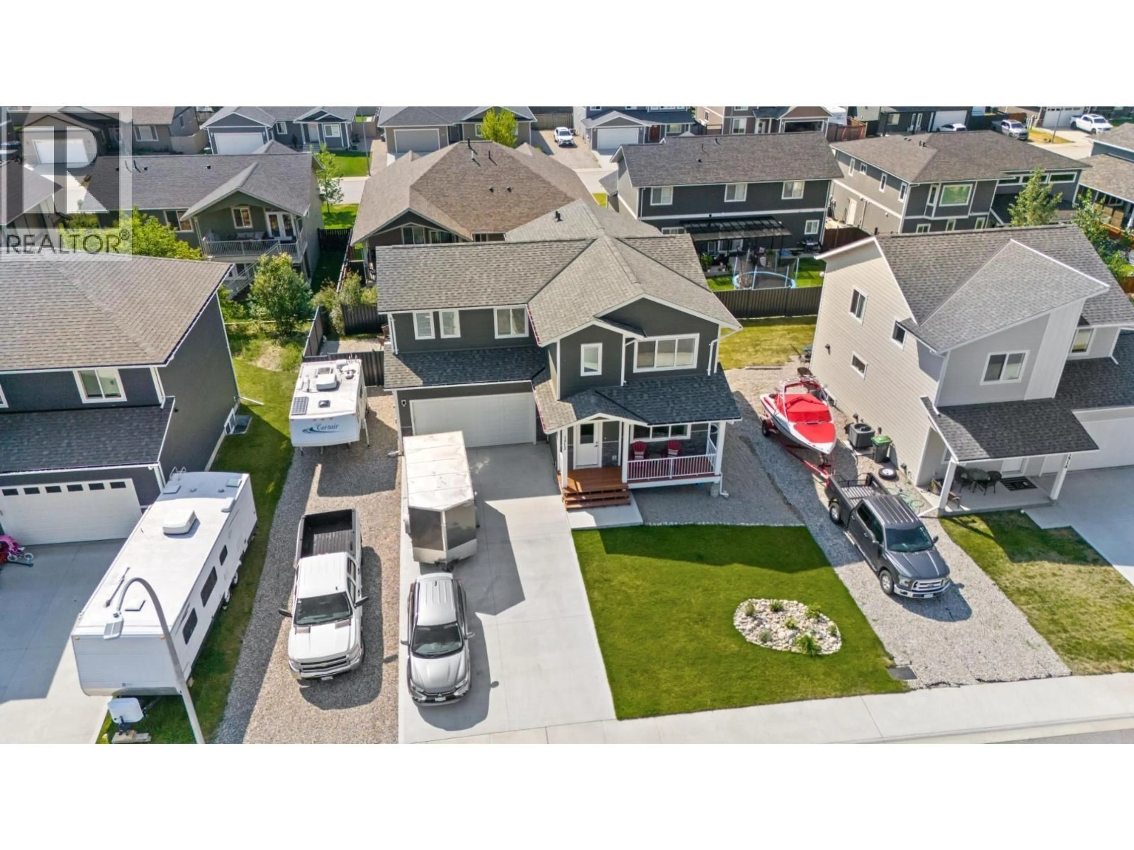 A pic from outside/outdoor area/front of a property/back of a property/a pic from drone, street for 1512 ASPEN LANE, Castlegar British Columbia V1N4X8