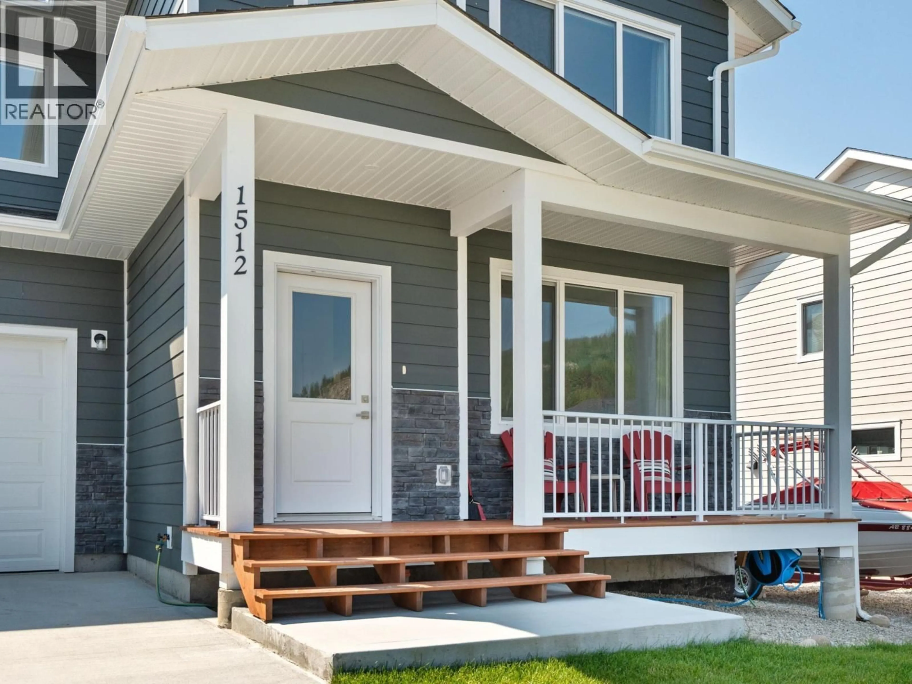 Home with vinyl exterior material, street for 1512 ASPEN LANE, Castlegar British Columbia V1N4X8