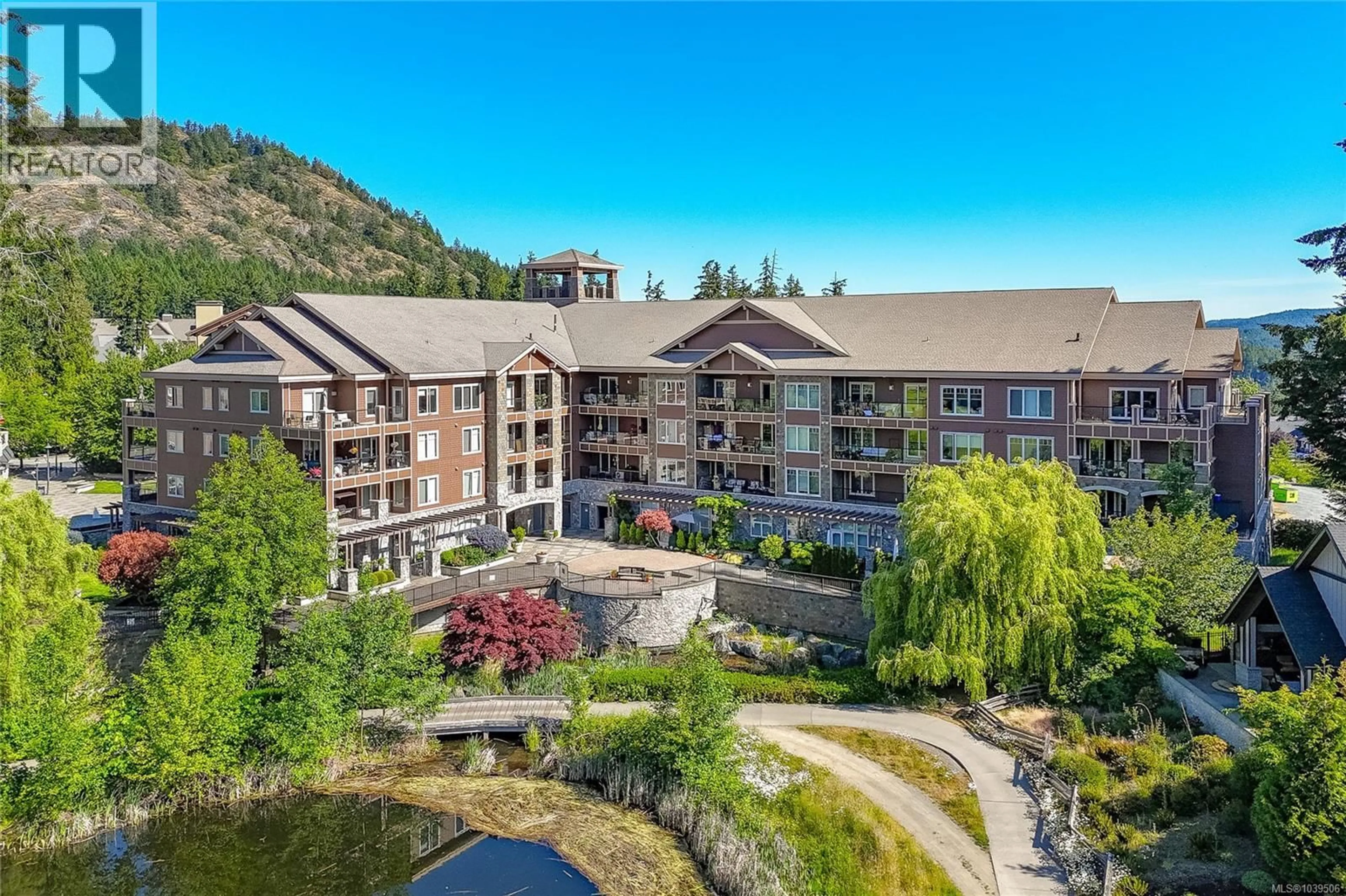 A pic from outside/outdoor area/front of a property/back of a property/a pic from drone, mountain view for 307 - 1325 BEAR MOUNTAIN PARKWAY, Langford British Columbia V9B6R3
