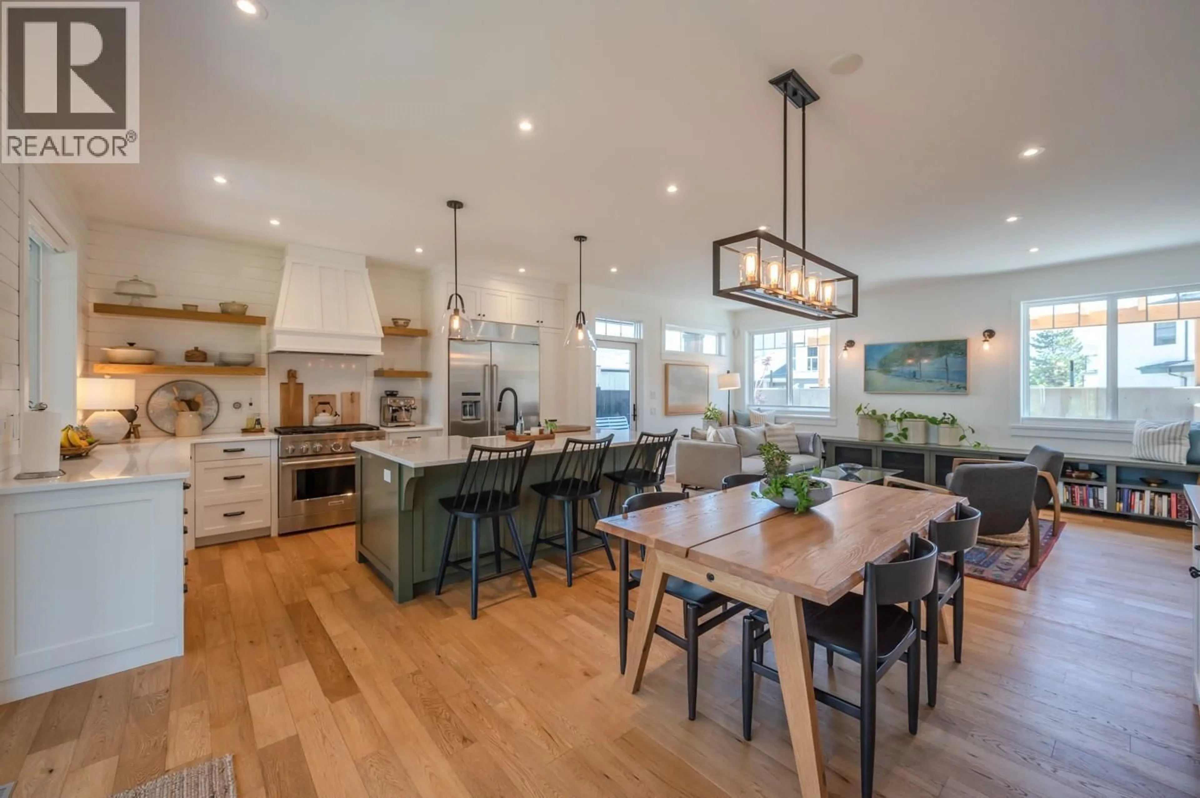 Open concept kitchen, wood/laminate floor for 876 JOHNSON STREET, Summerland British Columbia V0H1Z9
