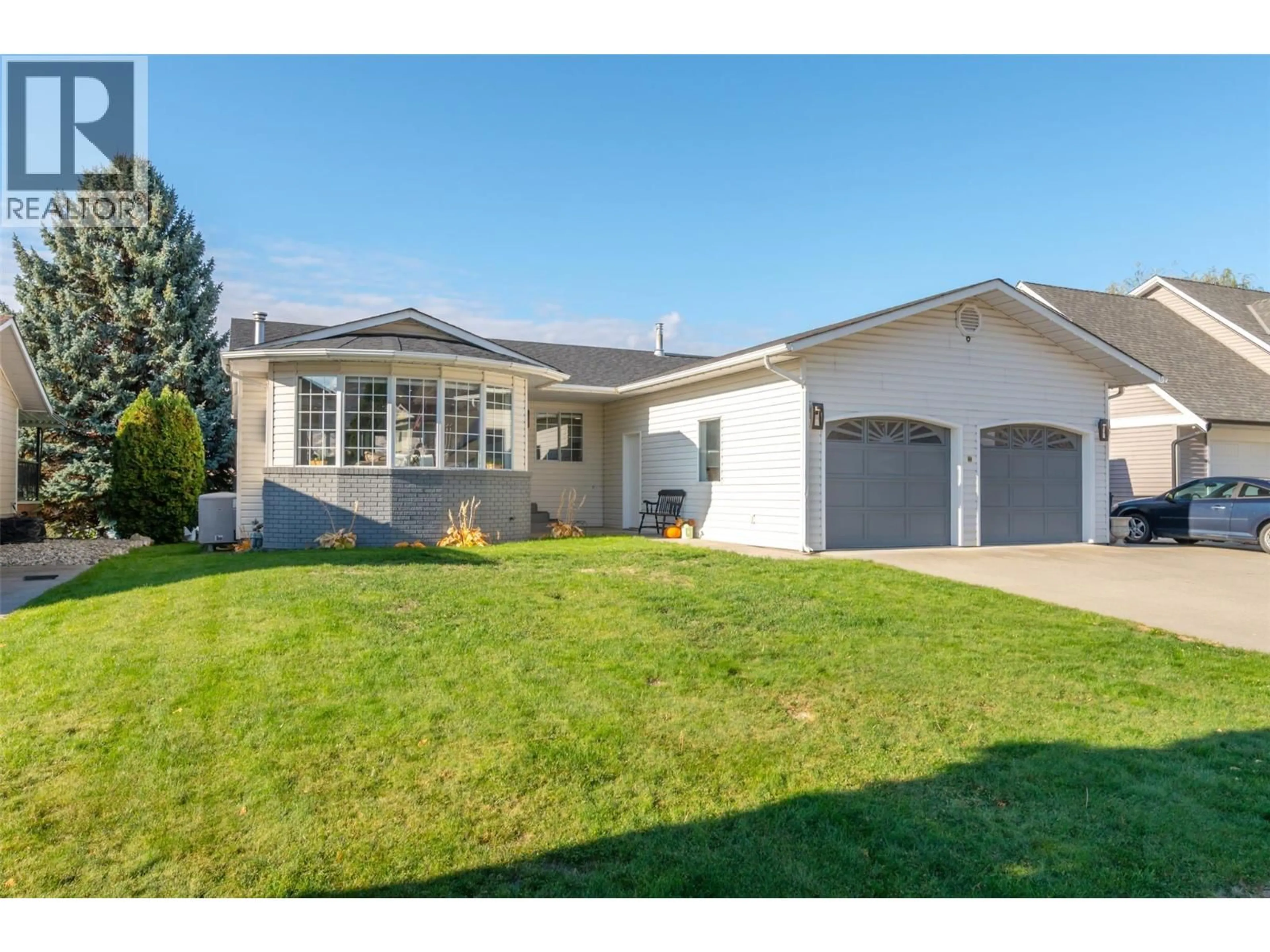 Home with vinyl exterior material, street for 38 BAYVIEW CRESCENT, Osoyoos British Columbia V0H1V6