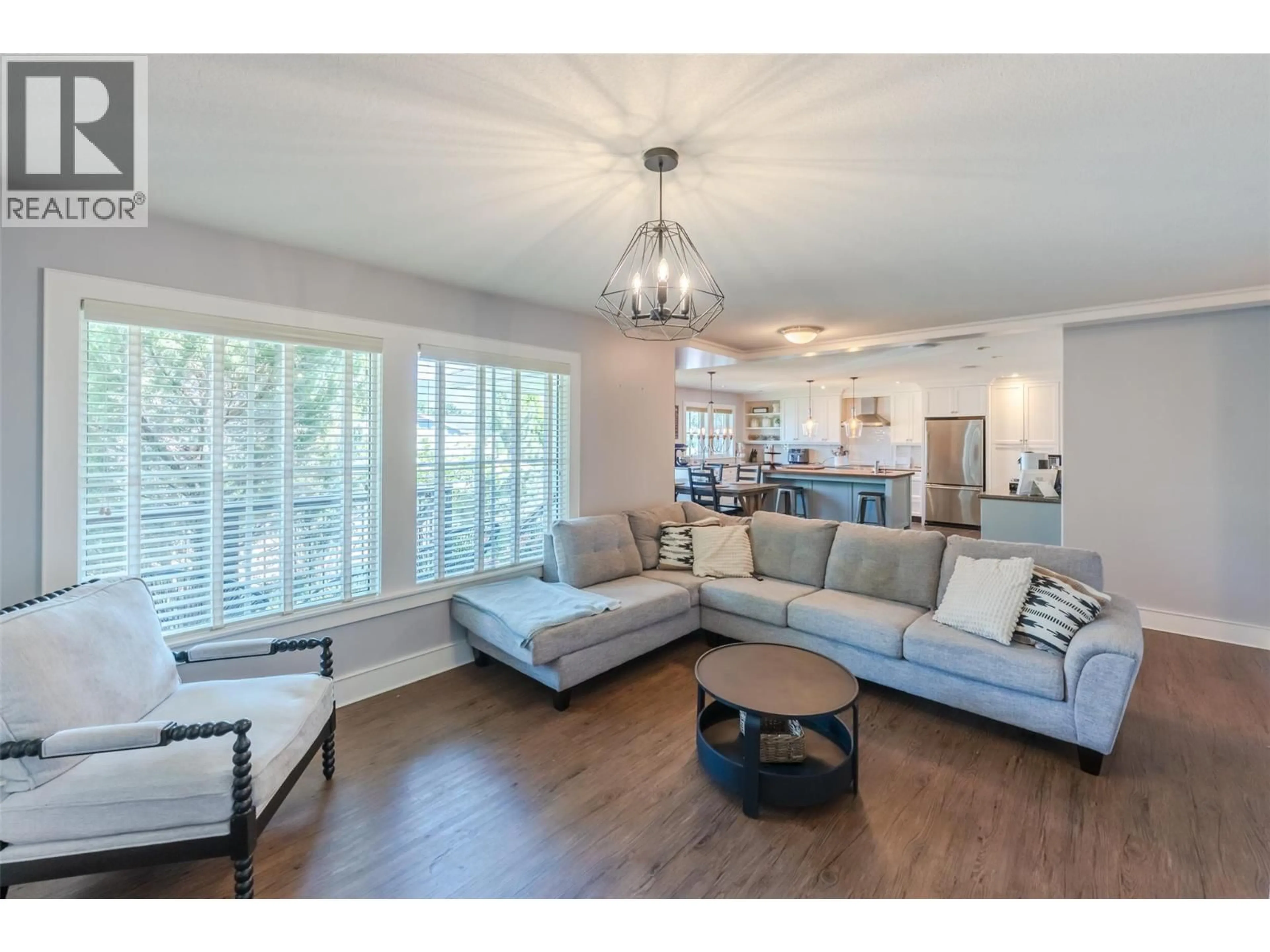 Living room with furniture, wood/laminate floor for 1507 WHARF STREET, Summerland British Columbia V0H1Z9