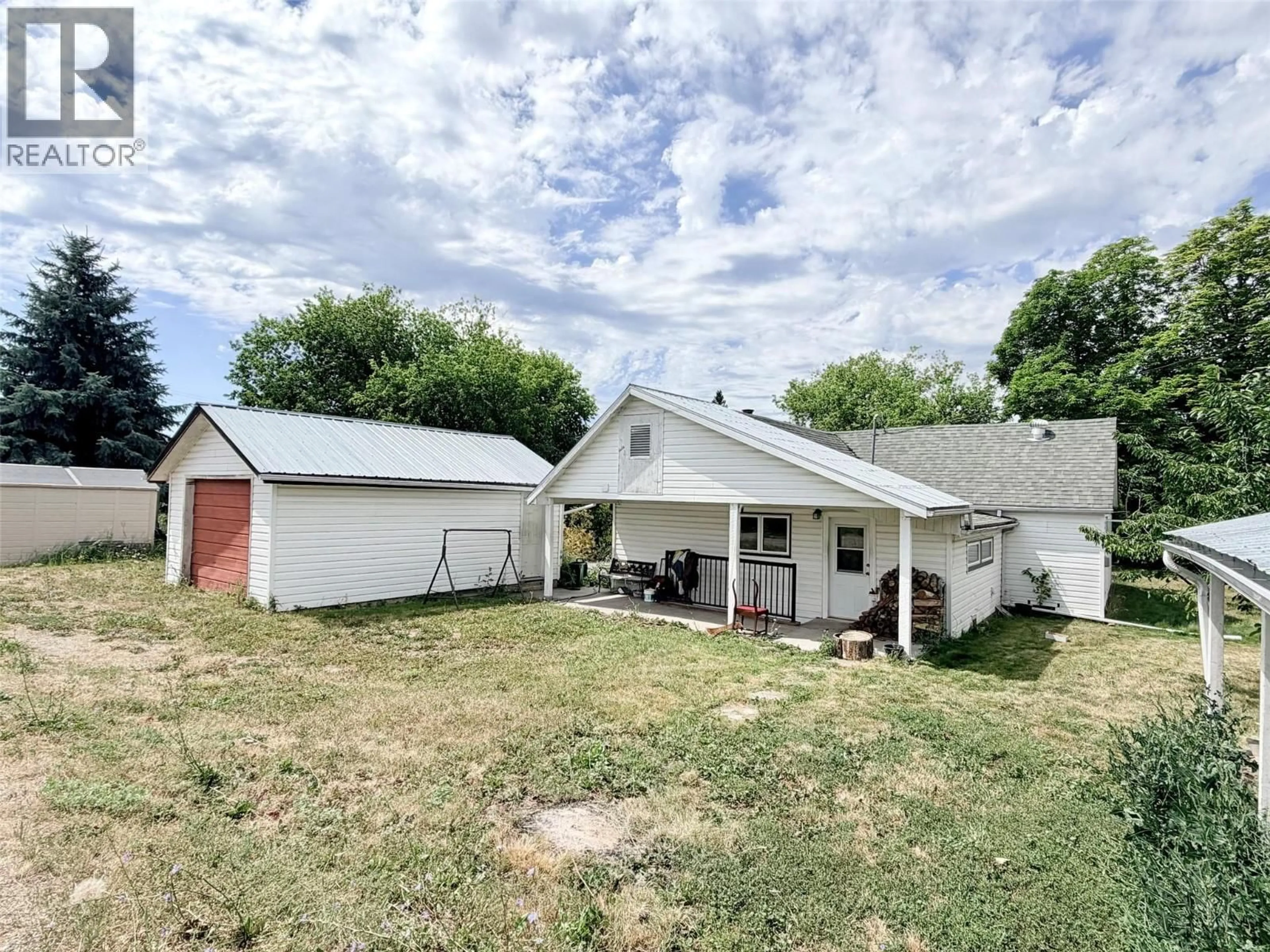 A pic from outside/outdoor area/front of a property/back of a property/a pic from drone, street for 112 7TH AVENUE NORTH, Creston British Columbia V0B1G3