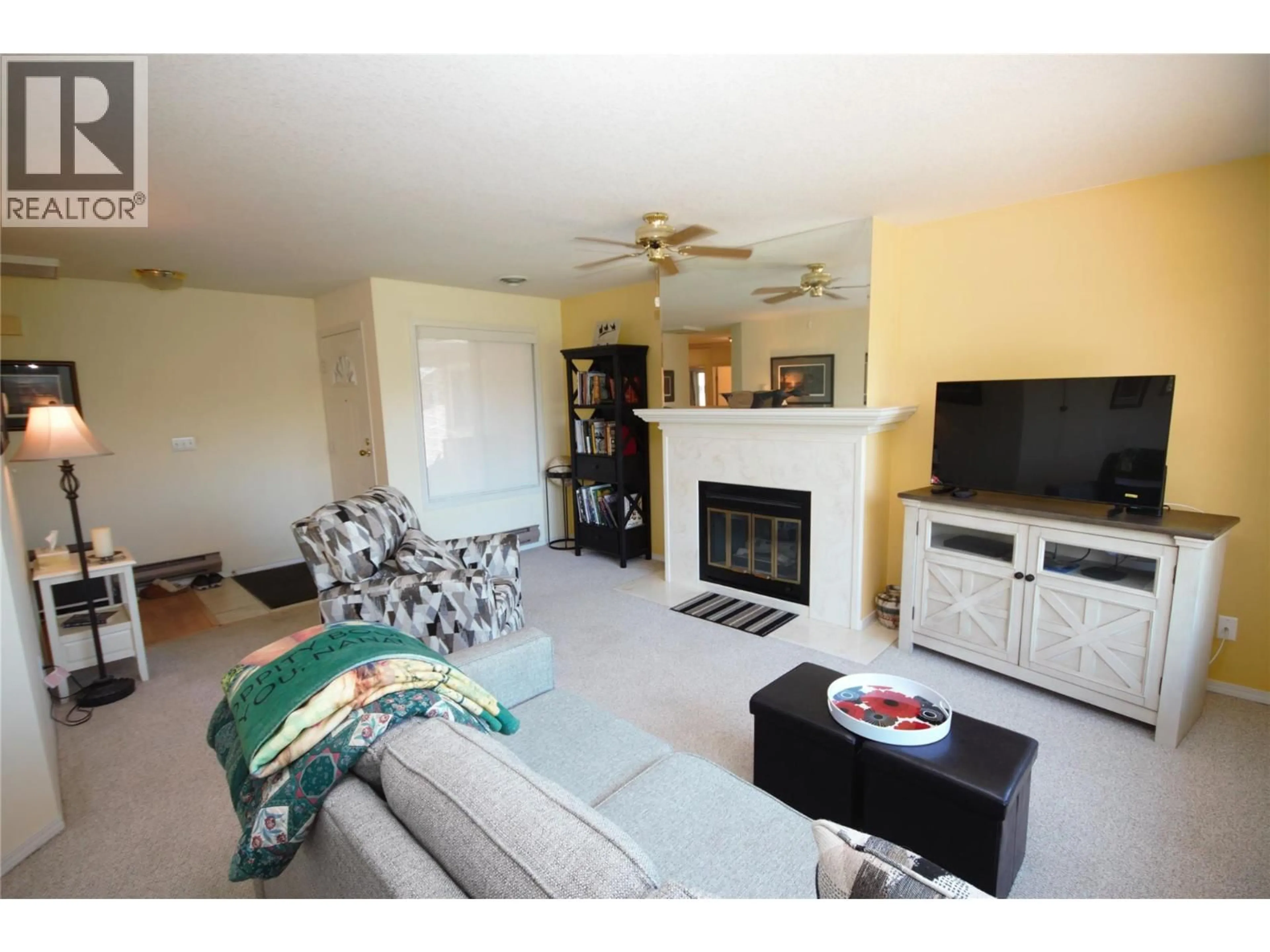 Living room with furniture, unknown for 202 - 320 BRANDON AVENUE, Penticton British Columbia V2A3S8
