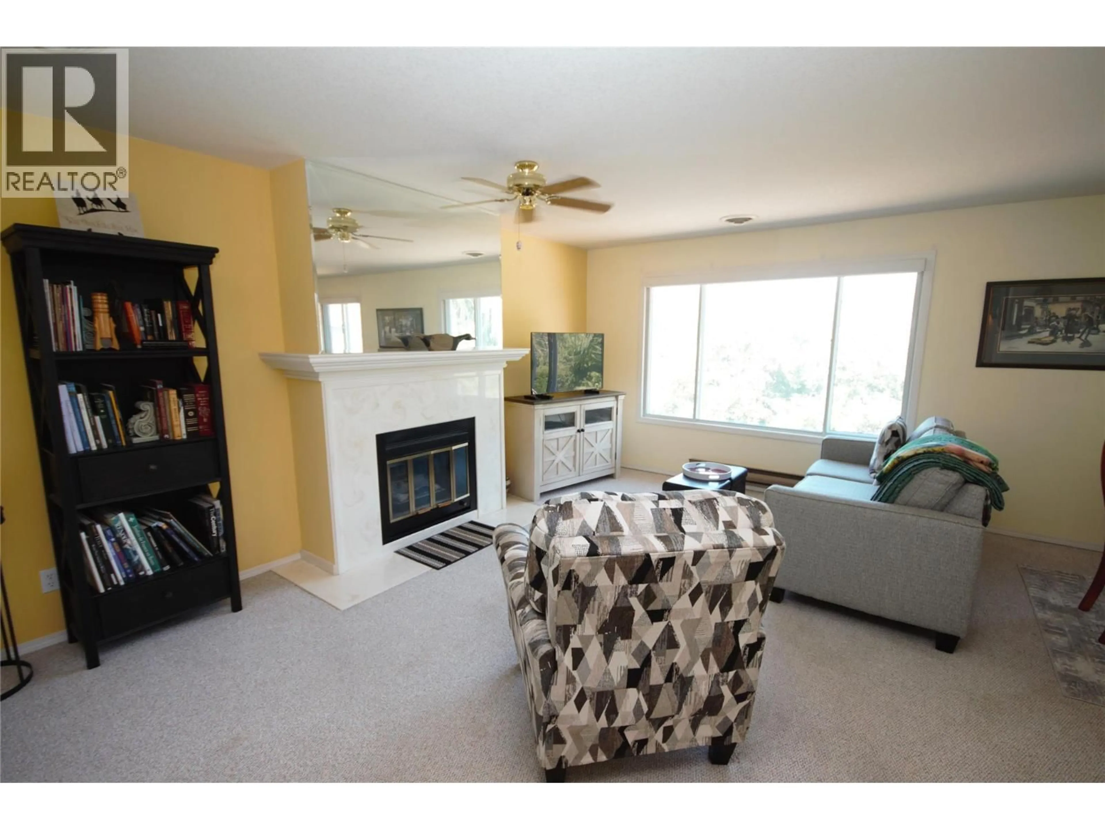 Living room with furniture, unknown for 202 - 320 BRANDON AVENUE, Penticton British Columbia V2A3S8
