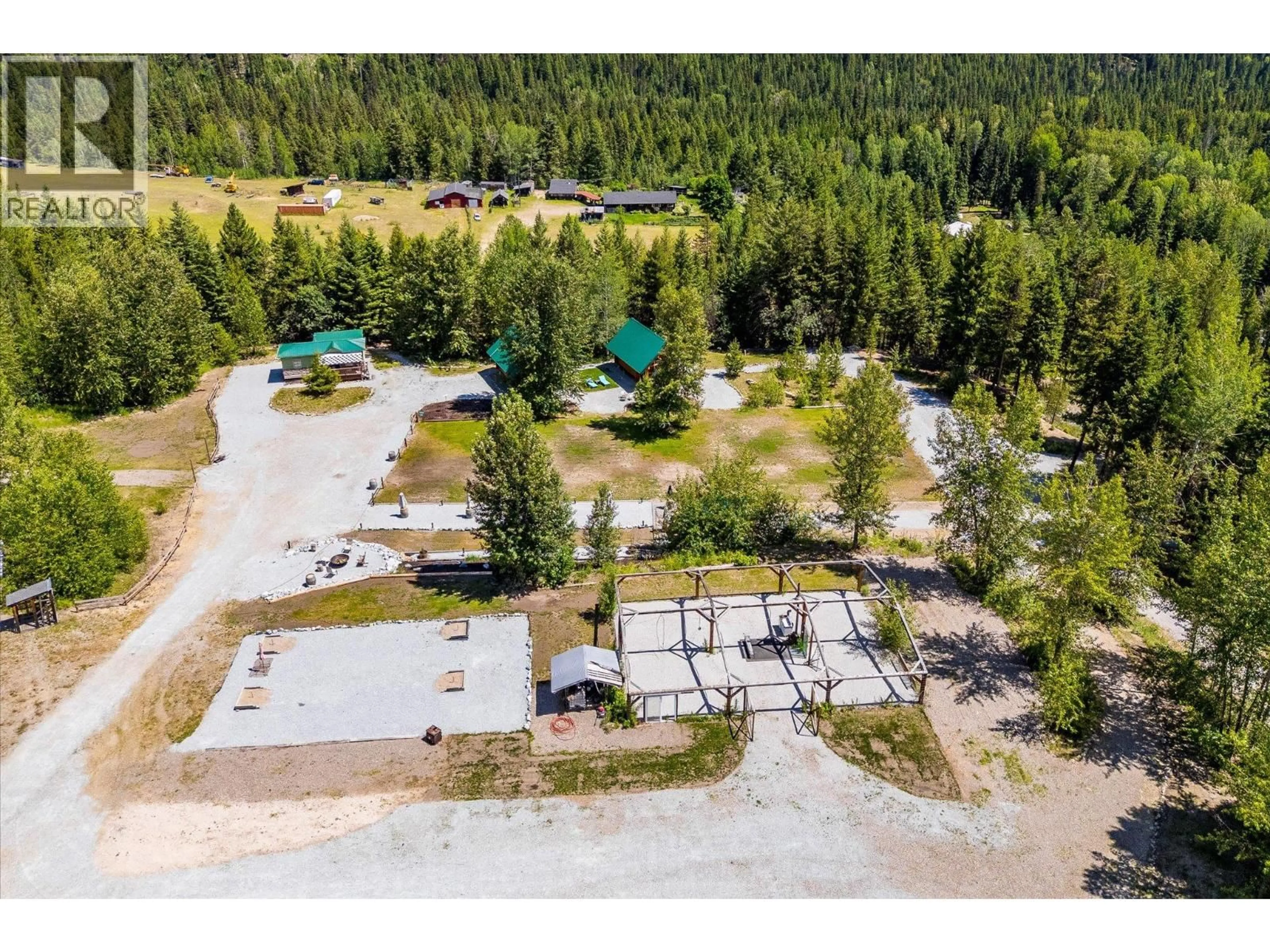 A pic from outside/outdoor area/front of a property/back of a property/a pic from drone, forest/trees view for 1230 PHILPOTT ROAD, Kelowna British Columbia V1P1J7
