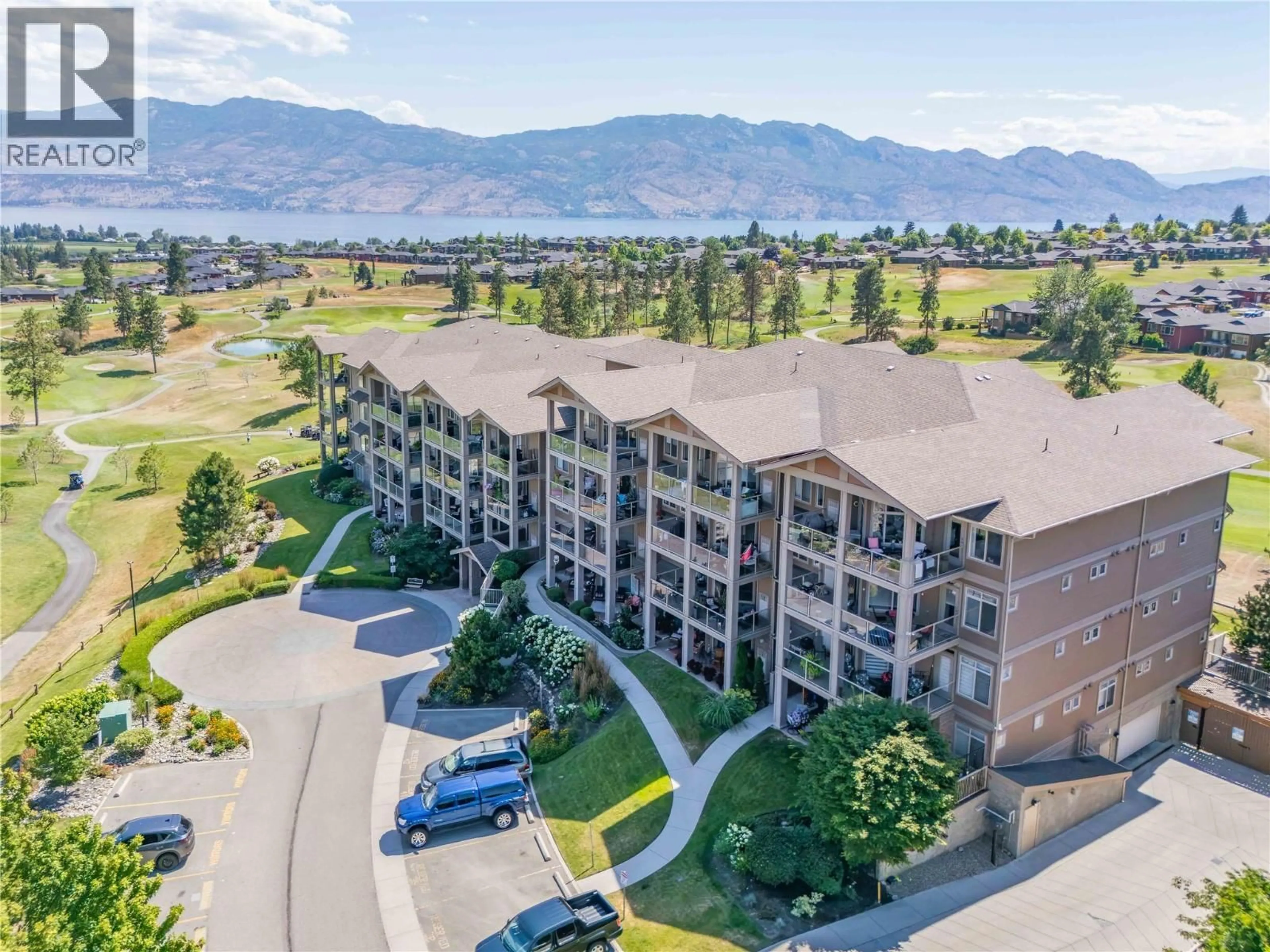 A pic from outside/outdoor area/front of a property/back of a property/a pic from drone, mountain view for 306 - 3545 CARRINGTON ROAD, West Kelowna British Columbia V4T3A1