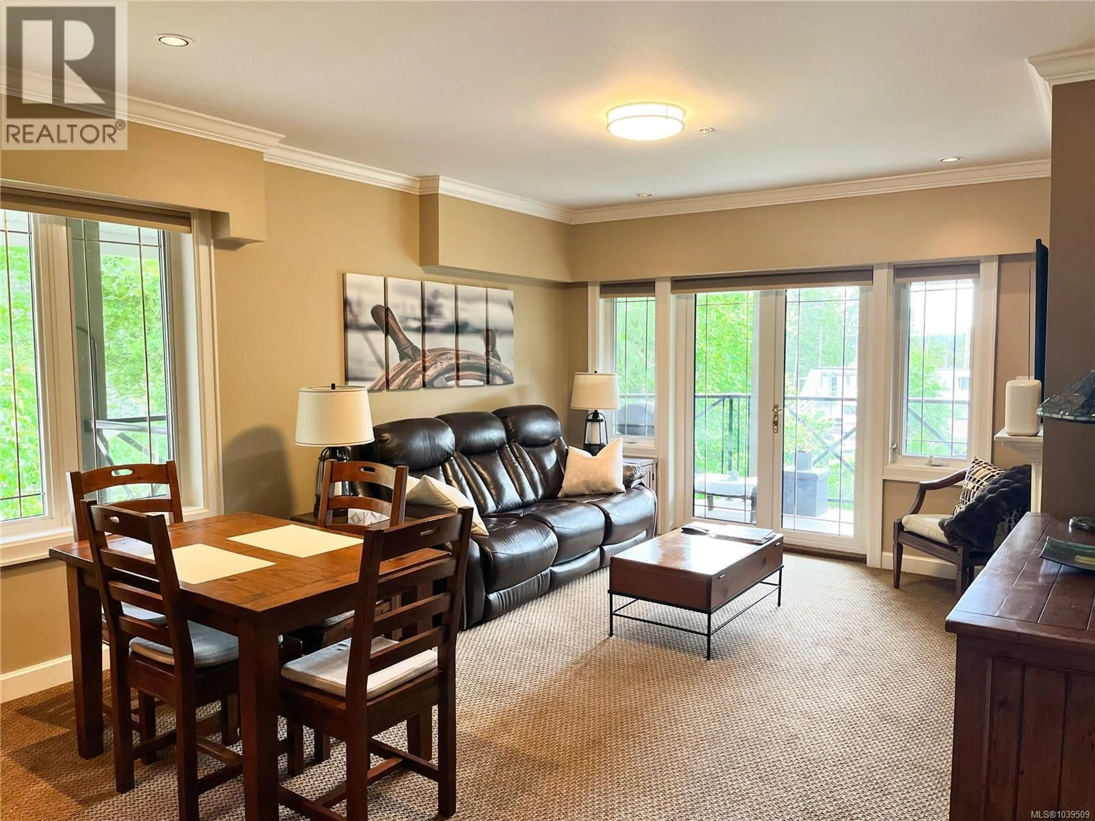 Living room with furniture, wood/laminate floor for 206 - 2326 HARBOUR ROAD, Sidney British Columbia V8L2P8