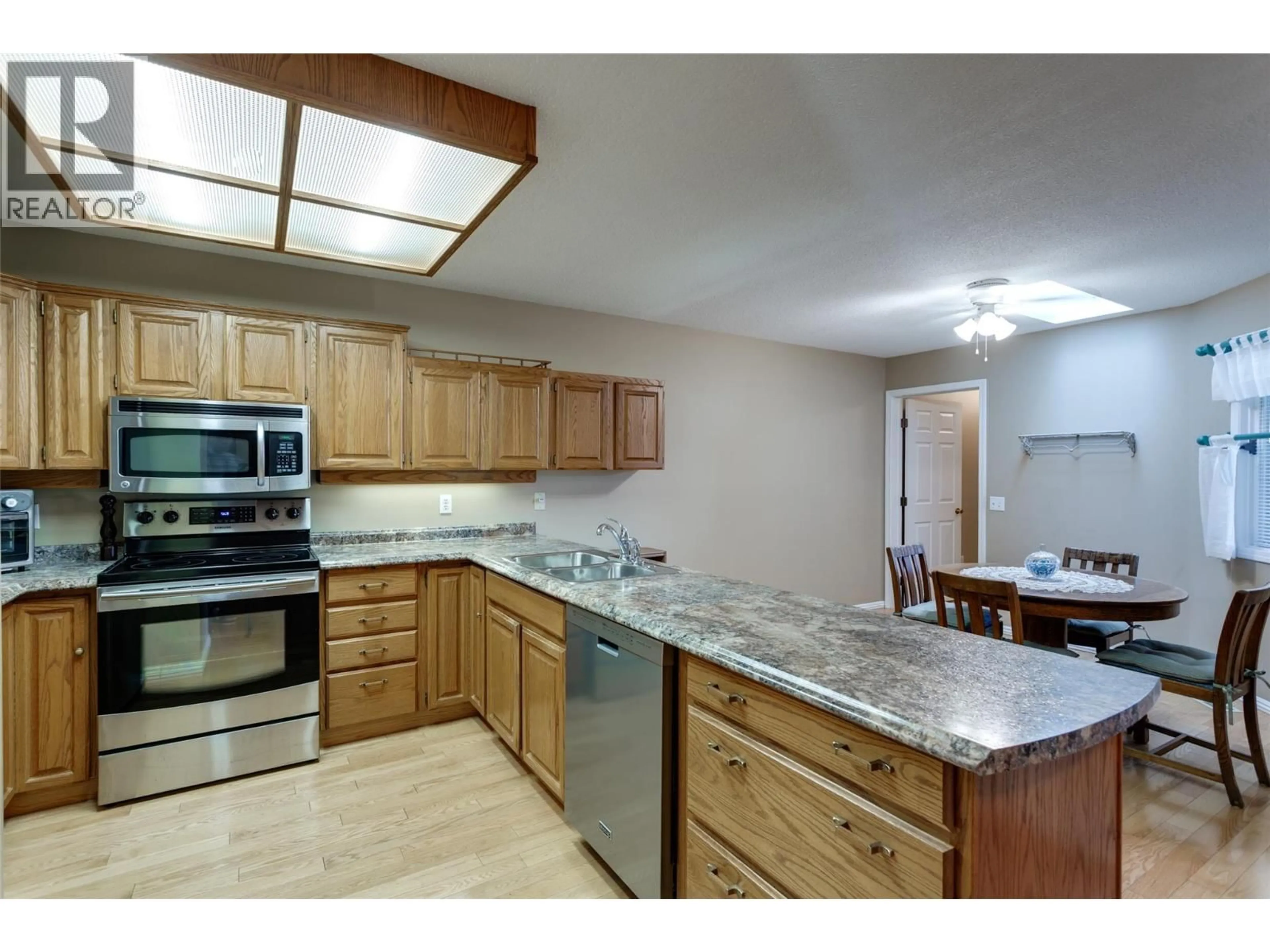 Standard kitchen, ceramic/tile floor for 16 - 950 LANFRANCO ROAD, Kelowna British Columbia V1W3W8