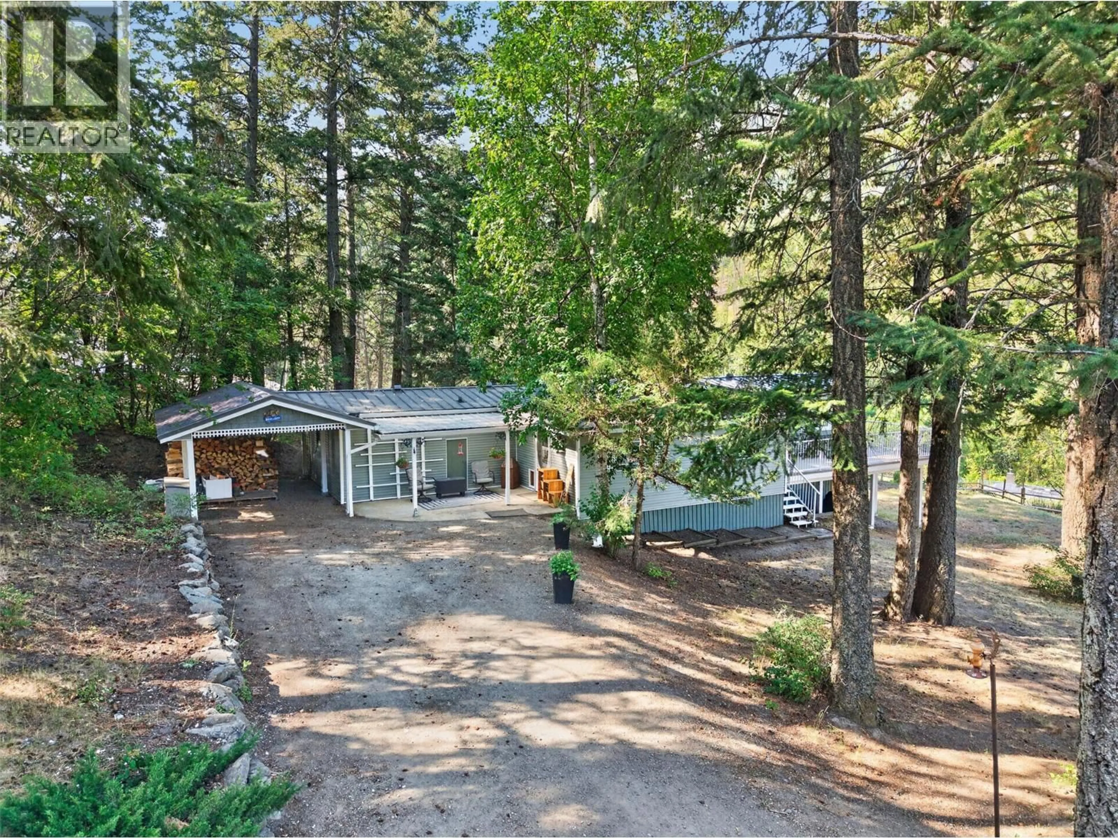 A pic from outside/outdoor area/front of a property/back of a property/a pic from drone, forest/trees view for 2464 CHASE-FALKLAND ROAD, Falkland British Columbia V0E1W1