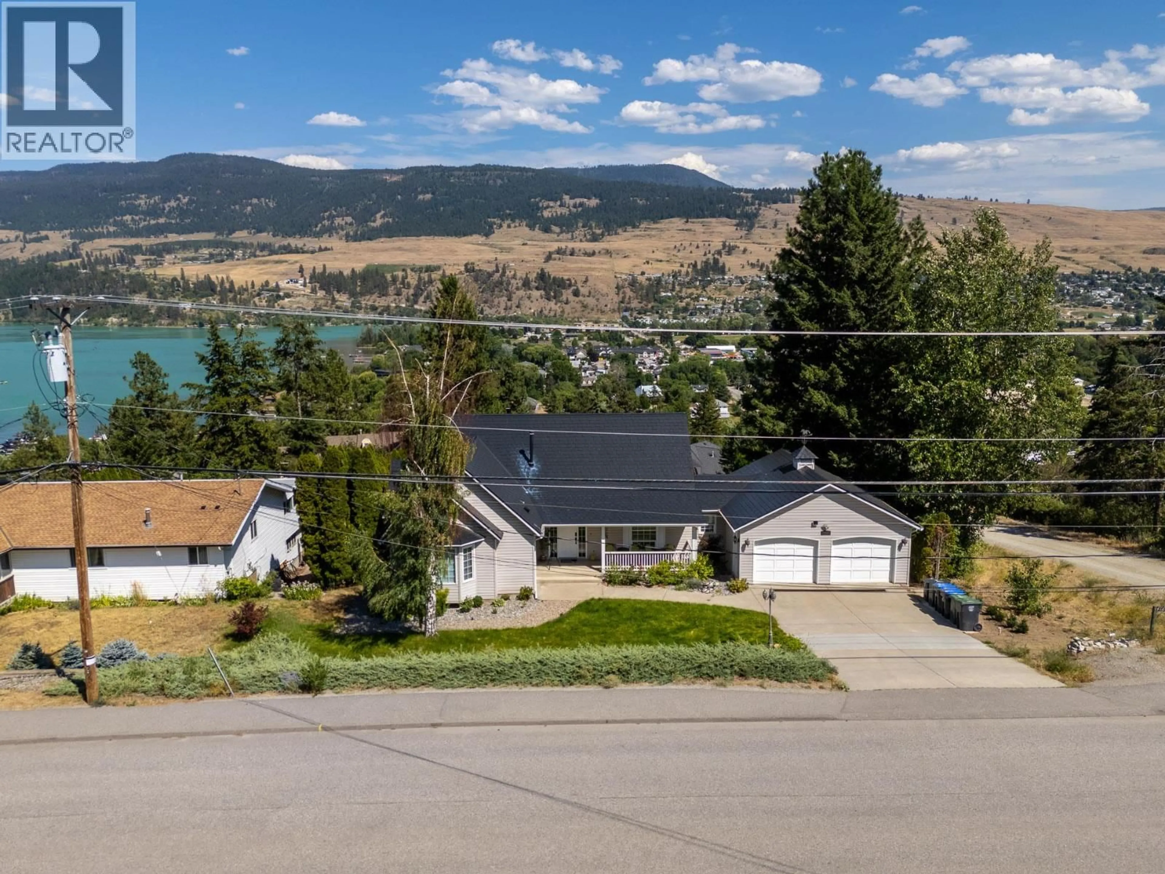 A pic from outside/outdoor area/front of a property/back of a property/a pic from drone, water/lake/river/ocean view for 11523 PRETTY ROAD, Lake Country British Columbia V4V1G6