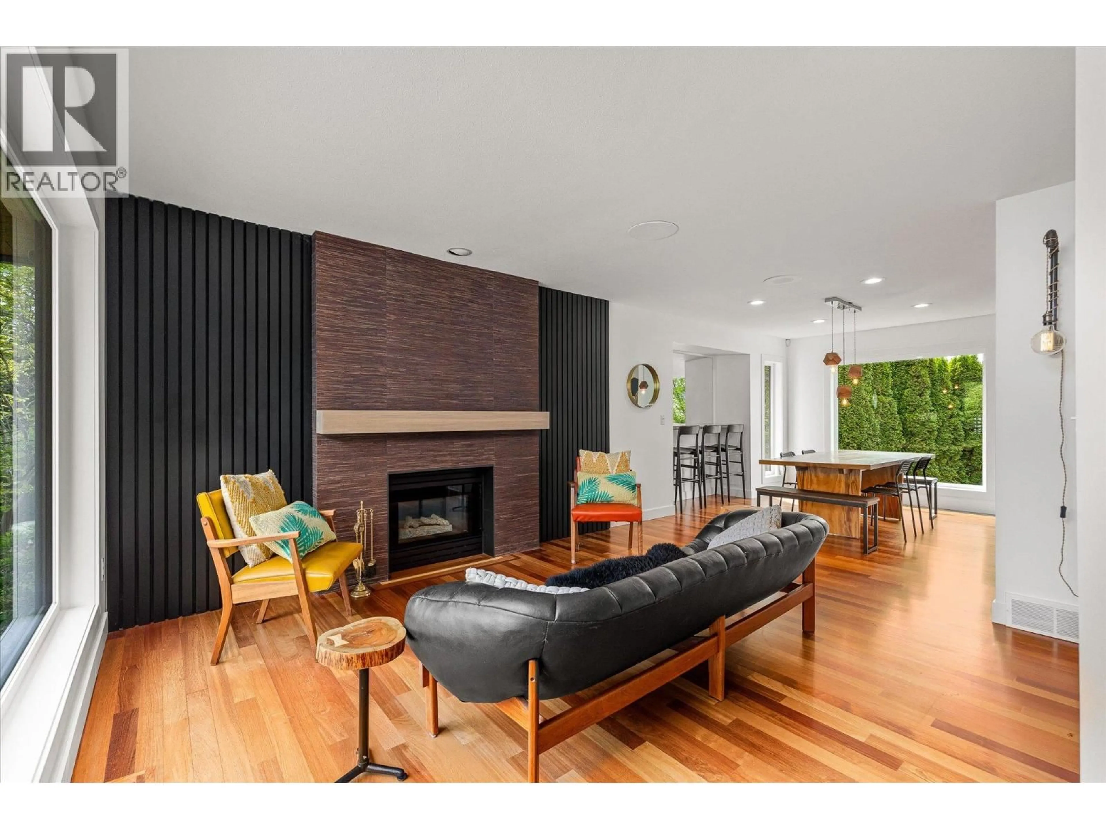 Living room with furniture, wood/laminate floor for 4350 BEDFORD LANE, Kelowna British Columbia V1W3C5