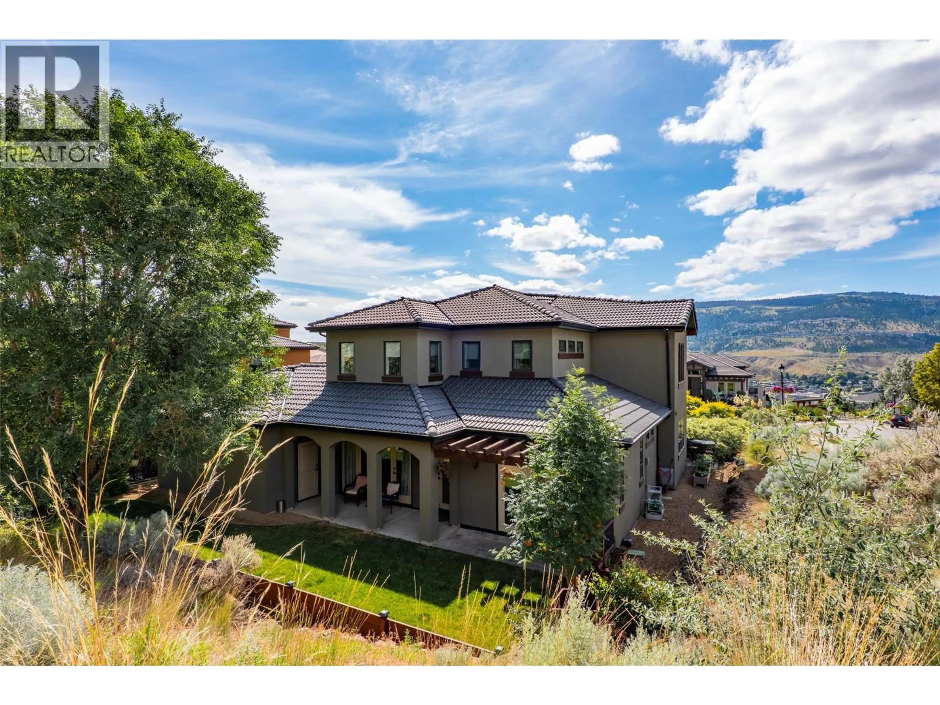 A pic from outside/outdoor area/front of a property/back of a property/a pic from drone, mountain view for 3001 VISAO COURT, Kamloops British Columbia V2H0C6