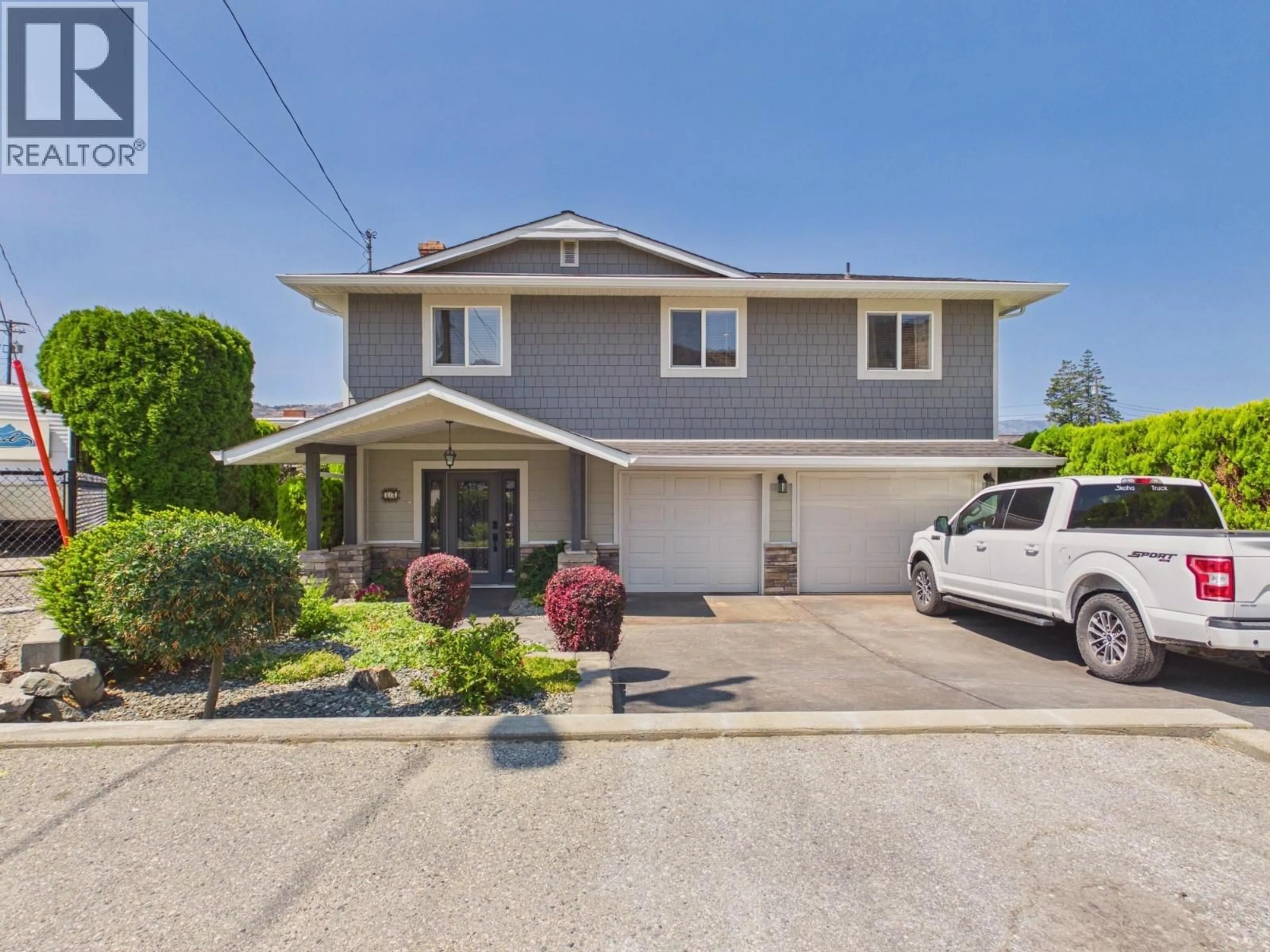 Home with vinyl exterior material, street for 22 WILLOW CRESCENT, Osoyoos British Columbia V0H1V3