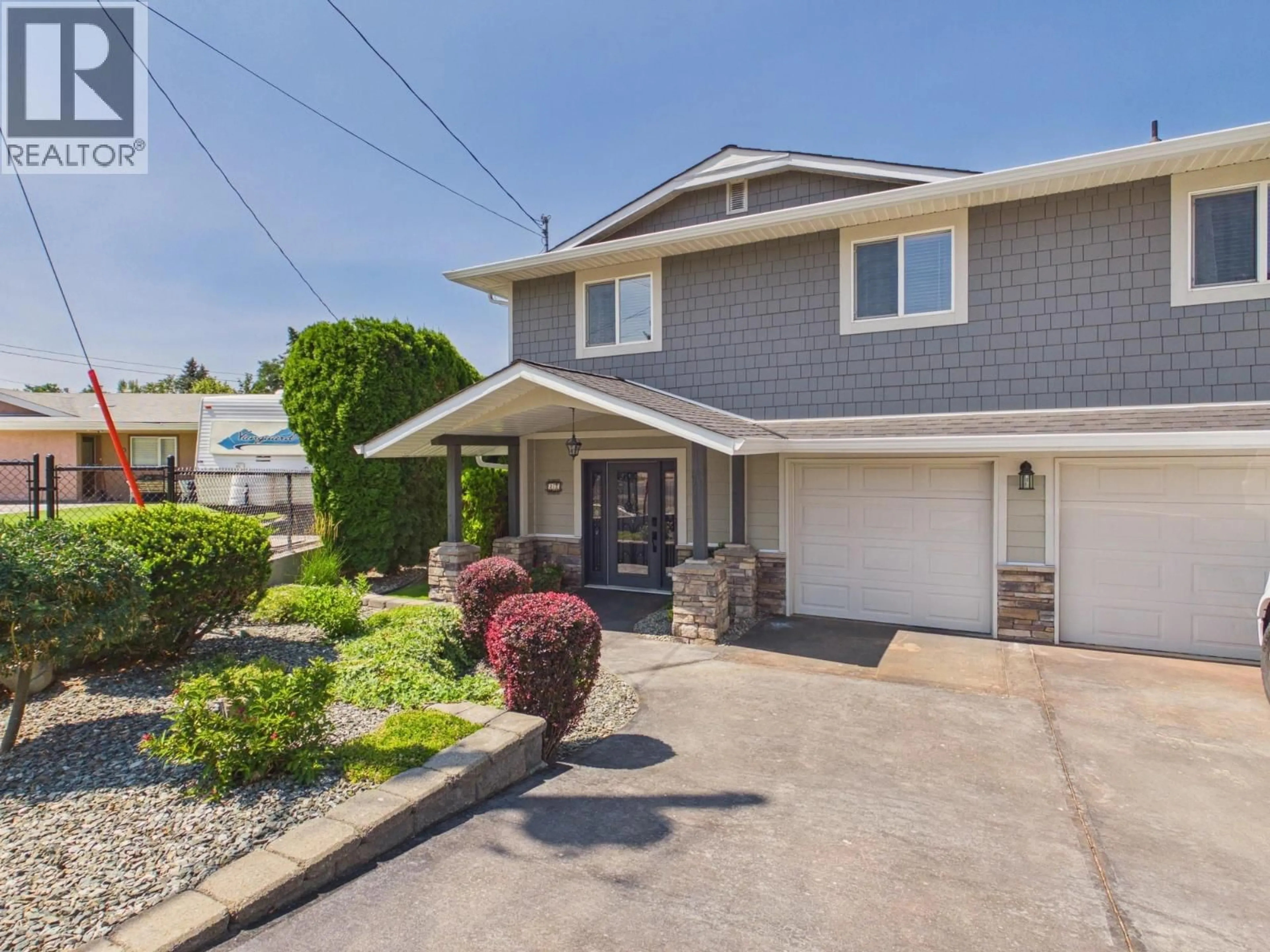 Home with vinyl exterior material, street for 22 WILLOW CRESCENT, Osoyoos British Columbia V0H1V3