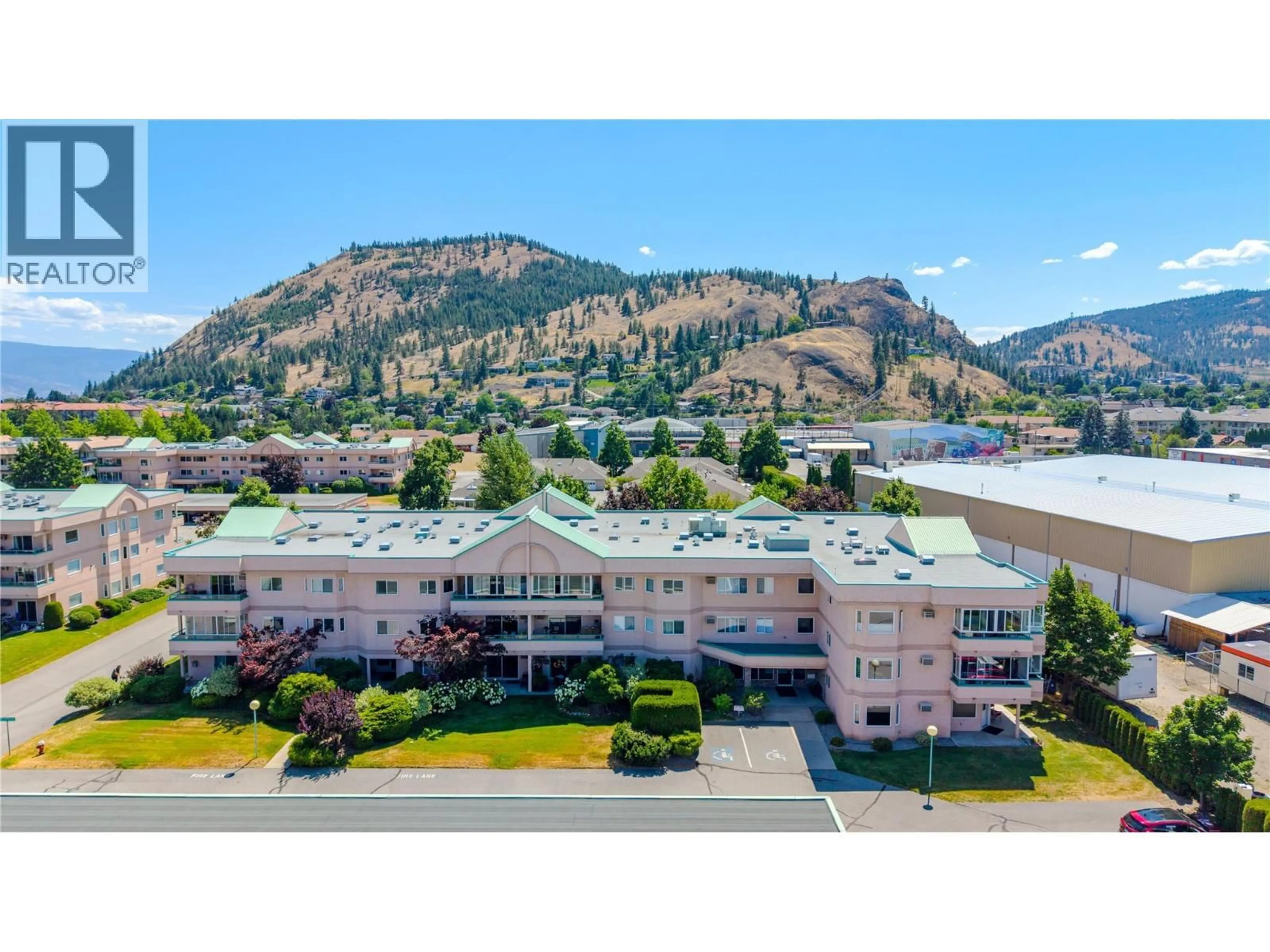 A pic from outside/outdoor area/front of a property/back of a property/a pic from drone, mountain view for 306 - 8907 PINEO COURT, Summerland British Columbia V0H1Z5