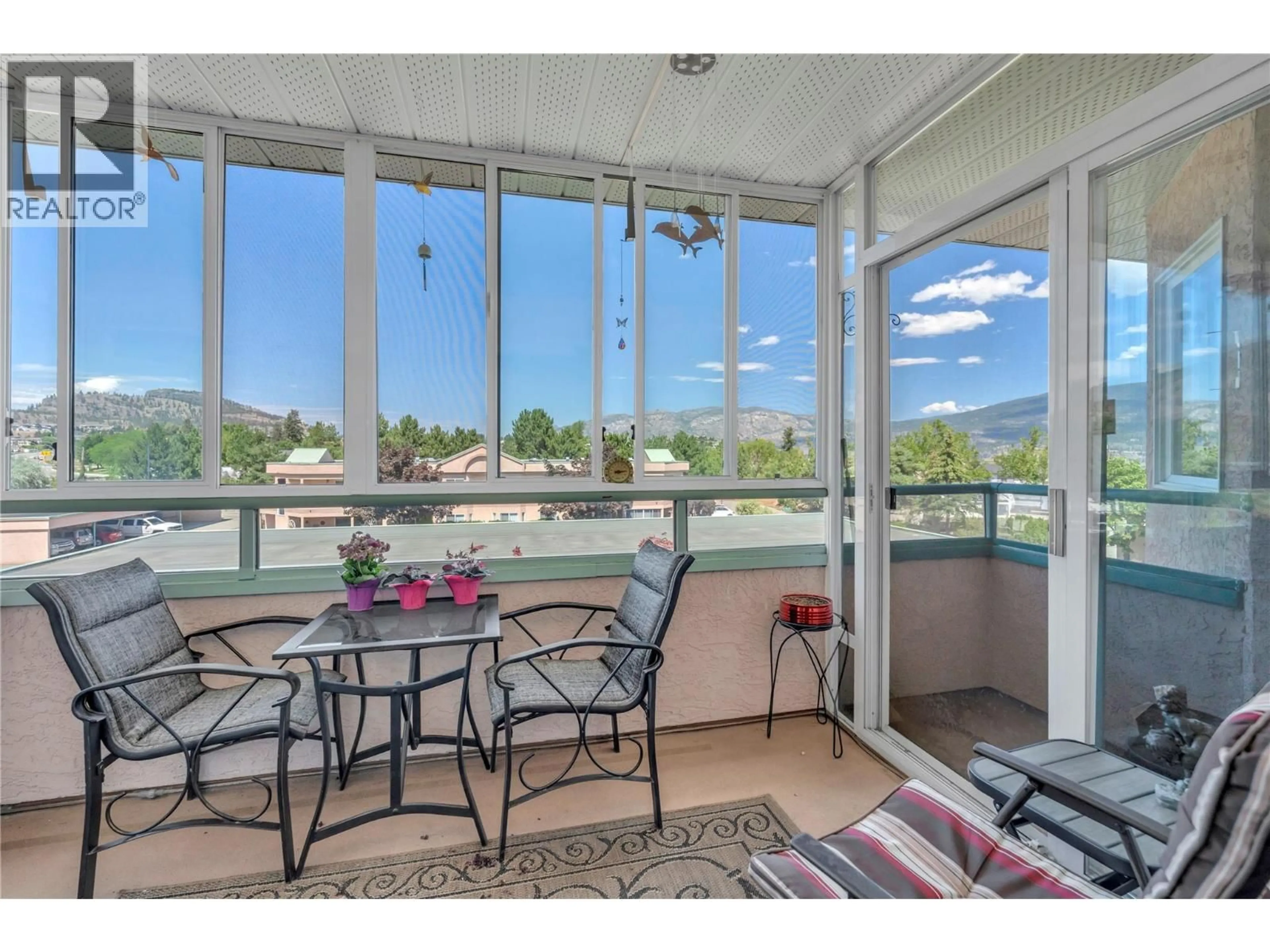 Balcony in the apartment, water/lake/river/ocean view for 306 - 8907 PINEO COURT, Summerland British Columbia V0H1Z5