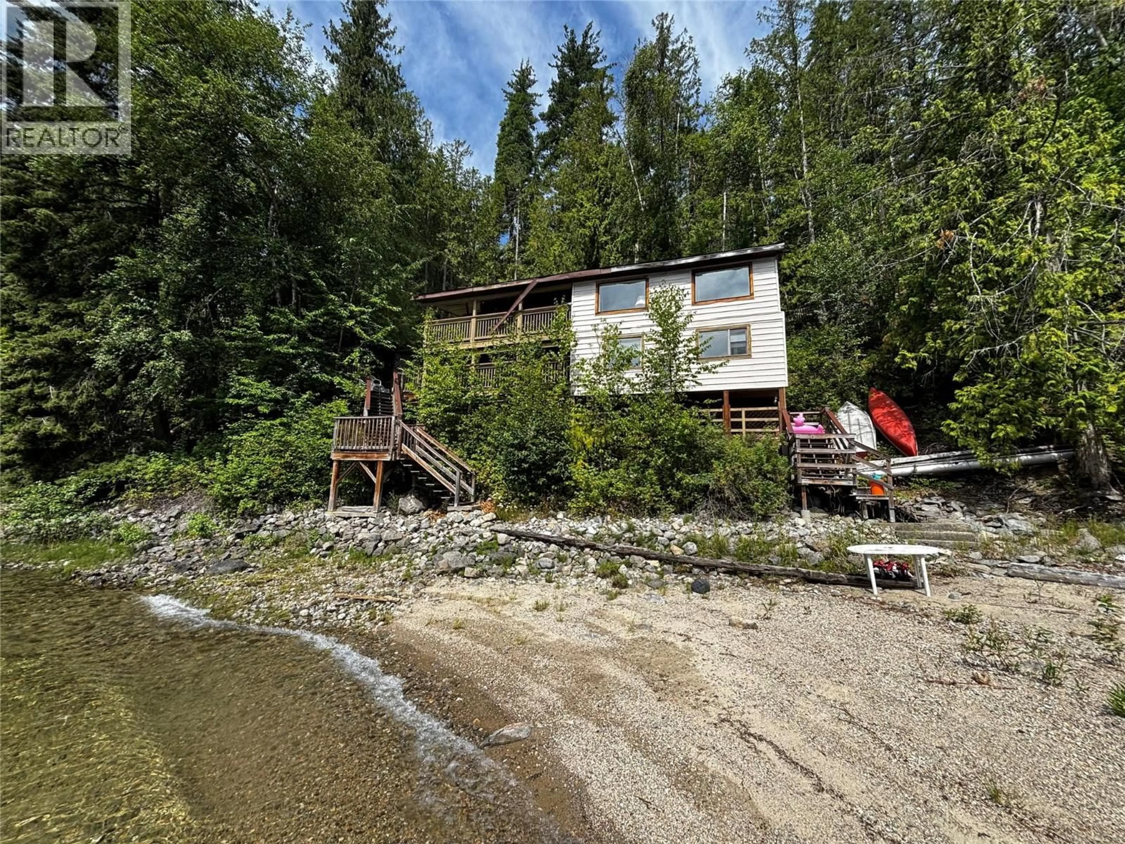 A pic from outside/outdoor area/front of a property/back of a property/a pic from drone, water/lake/river/ocean view for 26 SIMARD ROAD, Mabel Lake British Columbia V0E1V5