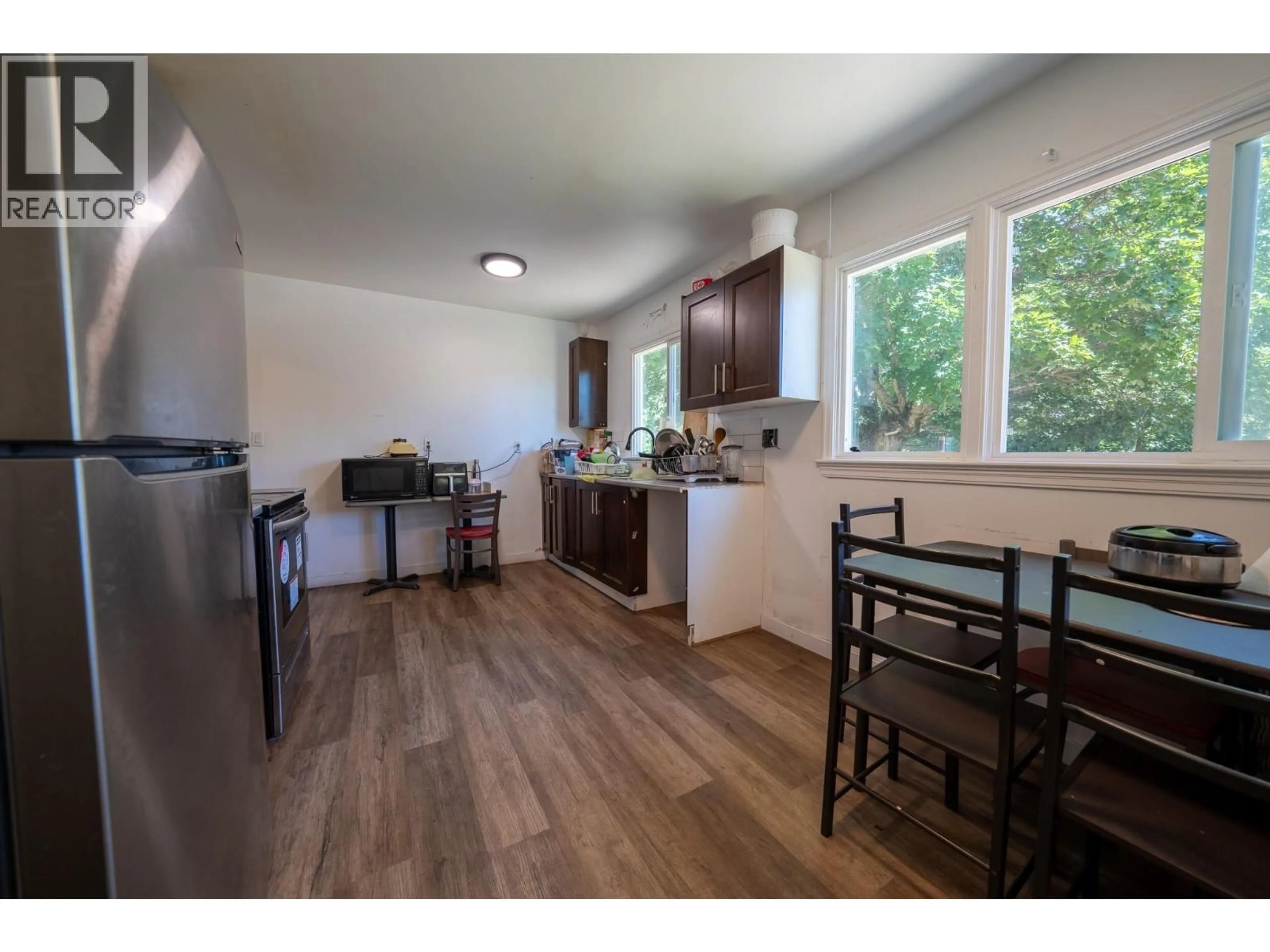 Open concept kitchen, wood/laminate floor for 778 CENTRAL AVENUE, Grand Forks British Columbia V0H1H0