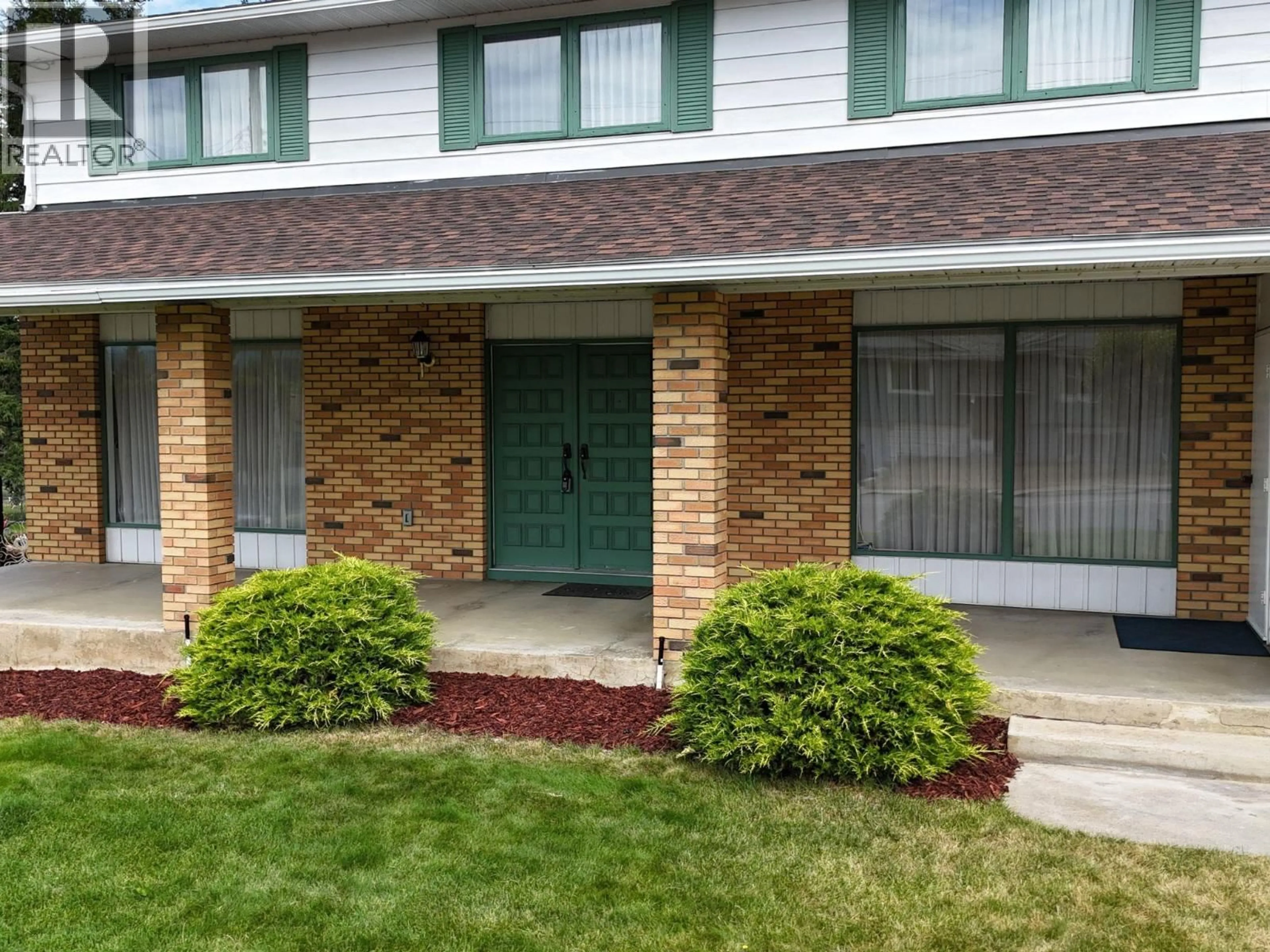 Home with brick exterior material, street for 2608 2ND STREET SOUTH, Cranbrook British Columbia V1C1E2