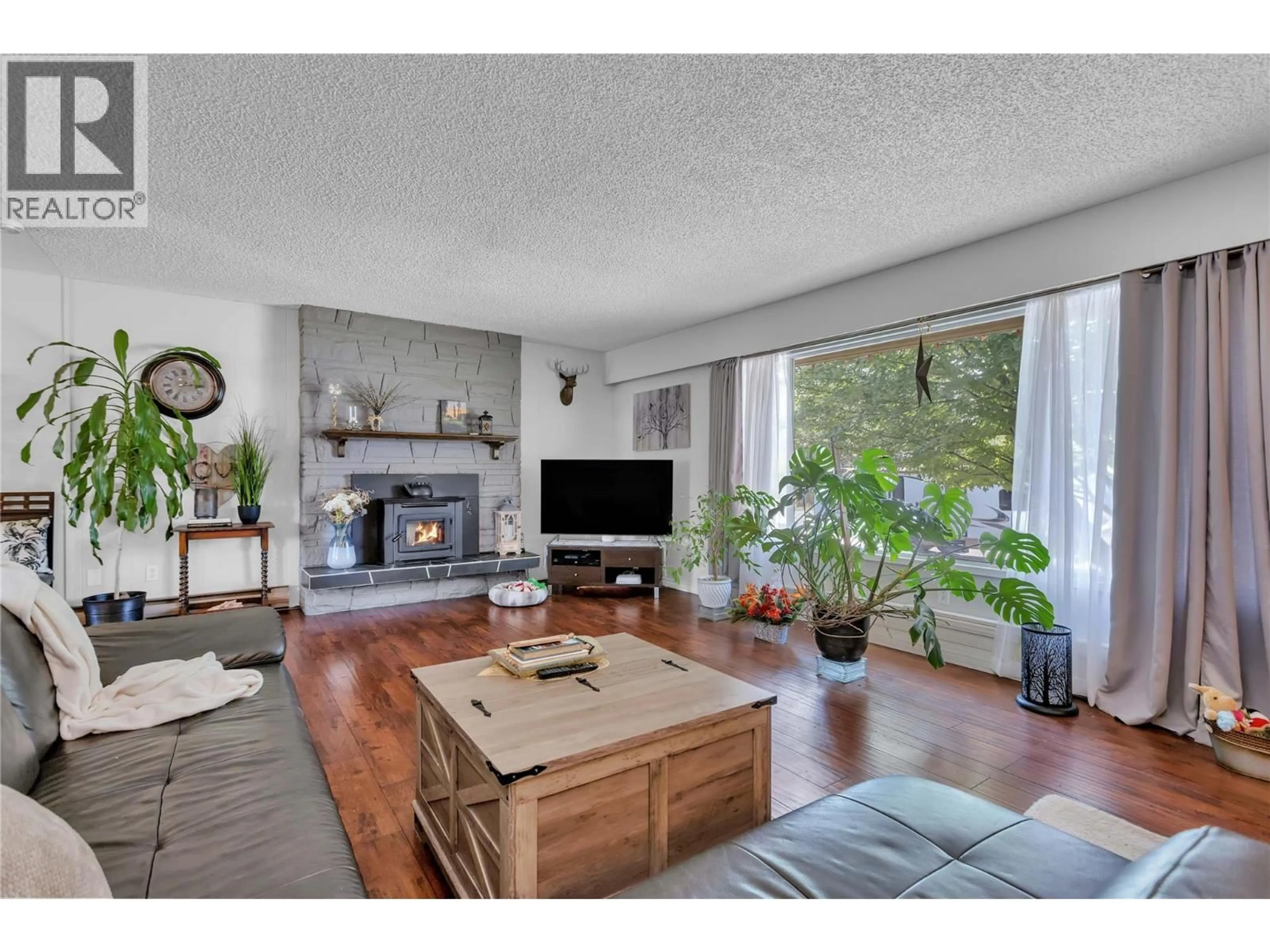 Living room with furniture, unknown for 3259 ST AMAND ROAD, Kelowna British Columbia V1W3P2