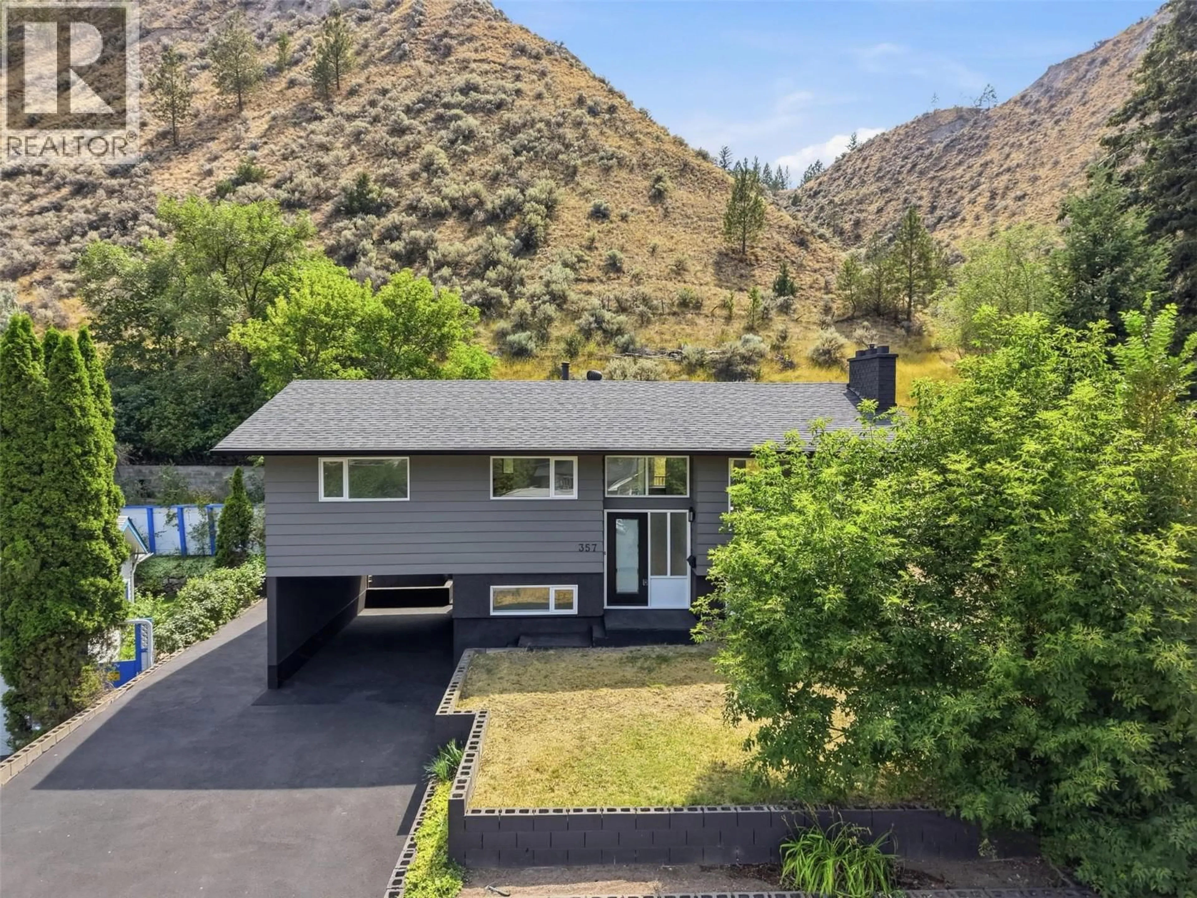 A pic from outside/outdoor area/front of a property/back of a property/a pic from drone, mountain view for 357 MACADAM ROAD, Kamloops British Columbia V2C4R5