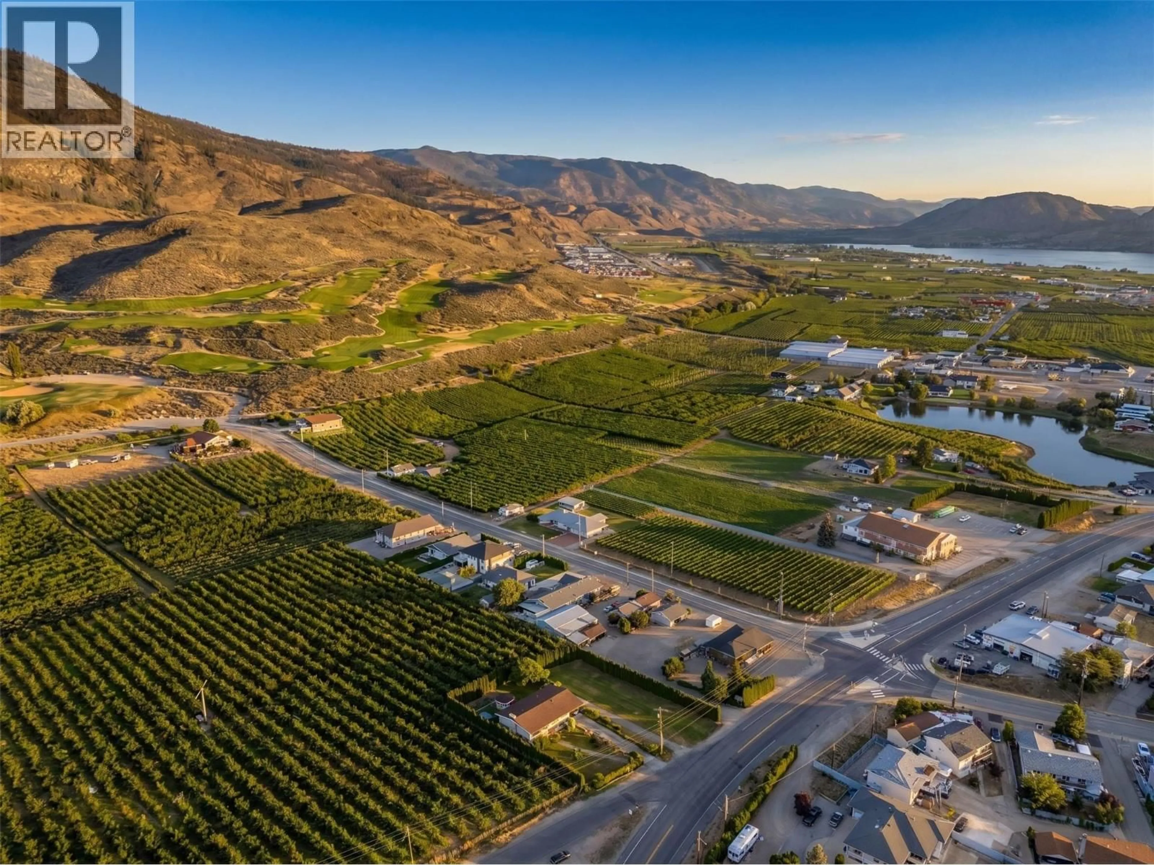 A pic from outside/outdoor area/front of a property/back of a property/a pic from drone, mountain view for 6012 107TH STREET, Osoyoos British Columbia V0H1V4