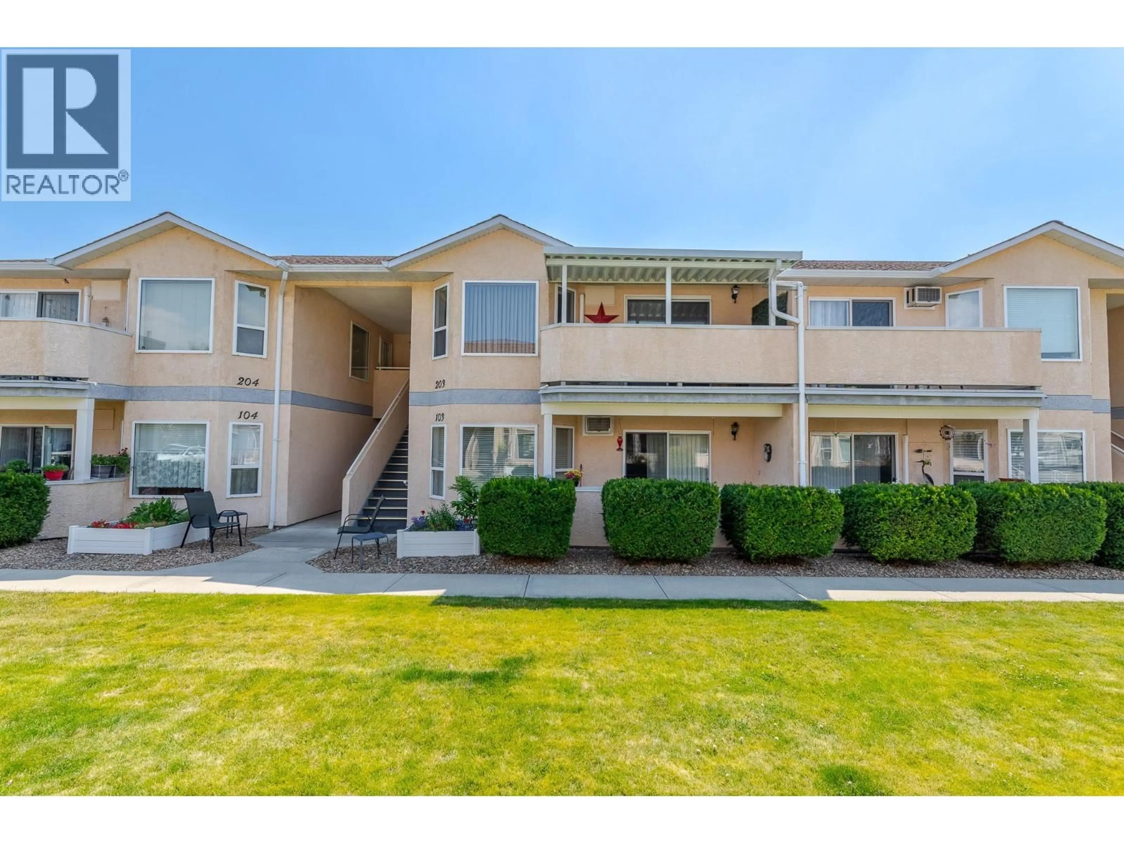 A pic from outside/outdoor area/front of a property/back of a property/a pic from drone, water/lake/river/ocean view for 203 - 13014 ARMSTRONG AVENUE, Summerland British Columbia V0H1Z5