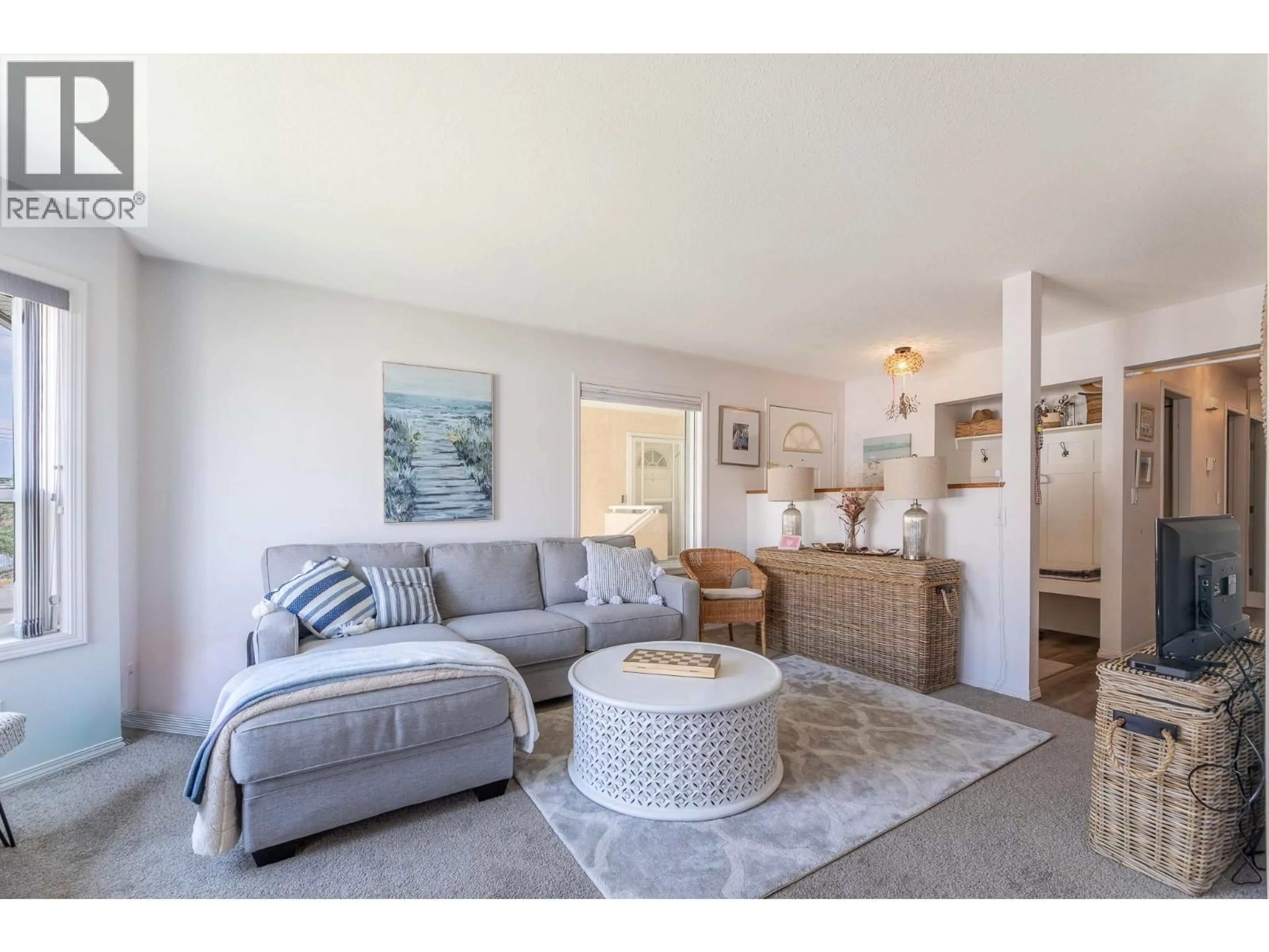 Living room with furniture, unknown for 203 - 13014 ARMSTRONG AVENUE, Summerland British Columbia V0H1Z5