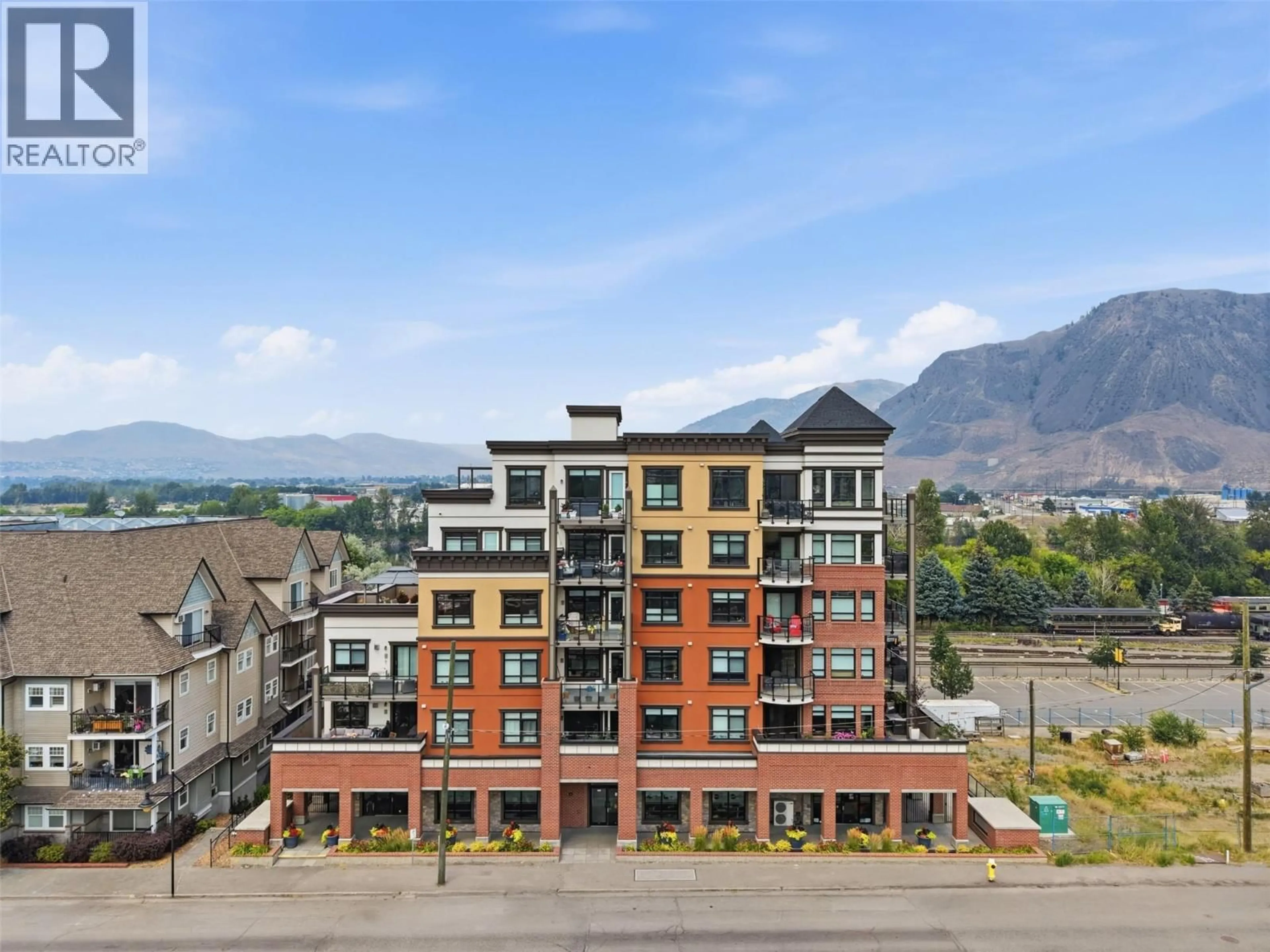 A pic from outside/outdoor area/front of a property/back of a property/a pic from drone, mountain view for 401 - 568 LORNE STREET, Kamloops British Columbia V2C1W3