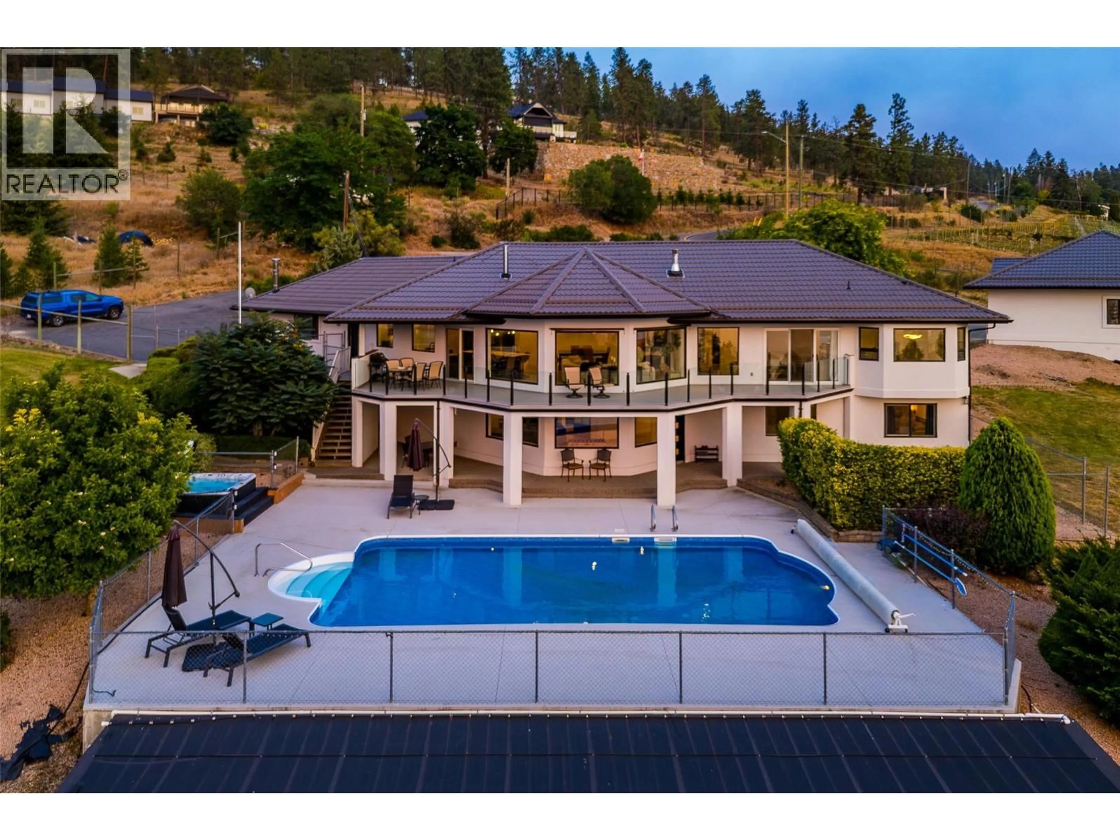 A pic from outside/outdoor area/front of a property/back of a property/a pic from drone, water/lake/river/ocean view for 1090 CAMP ROAD, Lake Country British Columbia V4V2H4