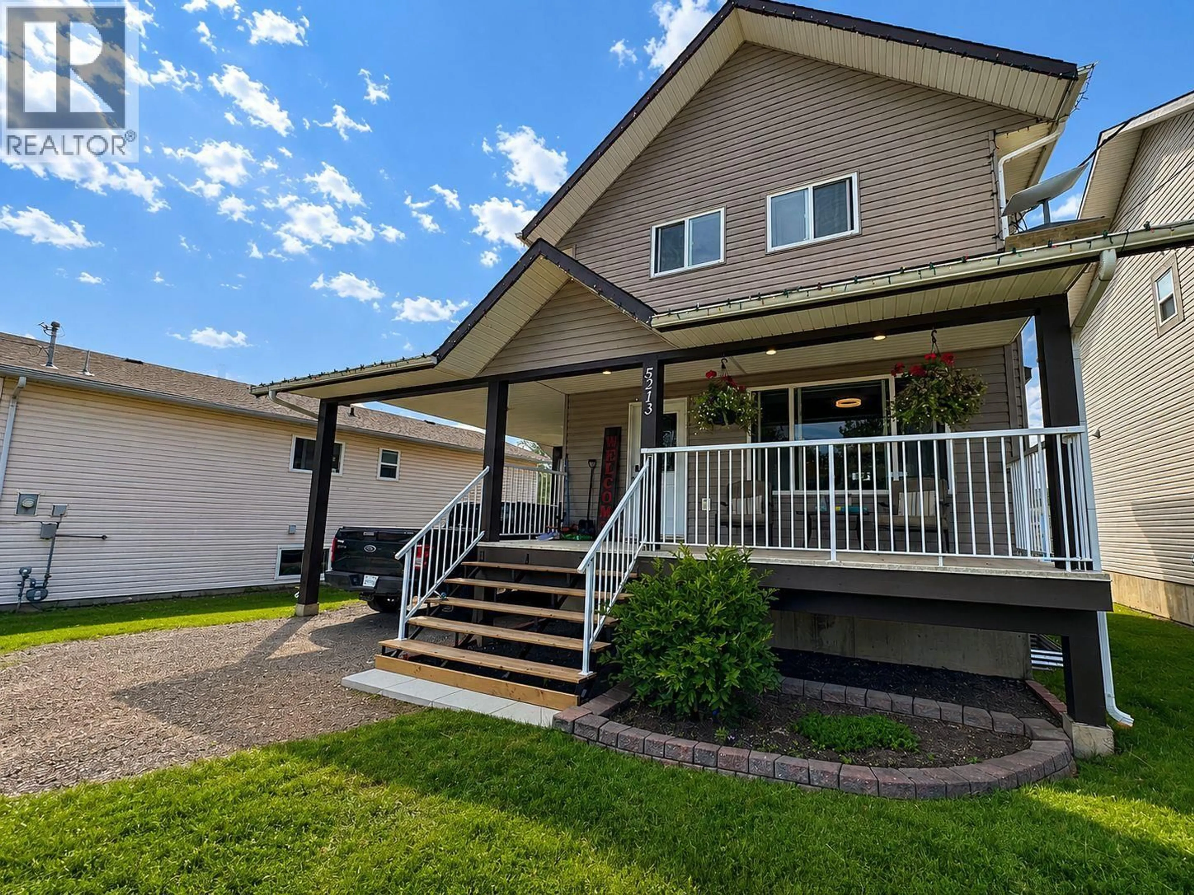 Home with vinyl exterior material, street for 5213 40 ST NE STREET, Chetwynd British Columbia V0C1J0