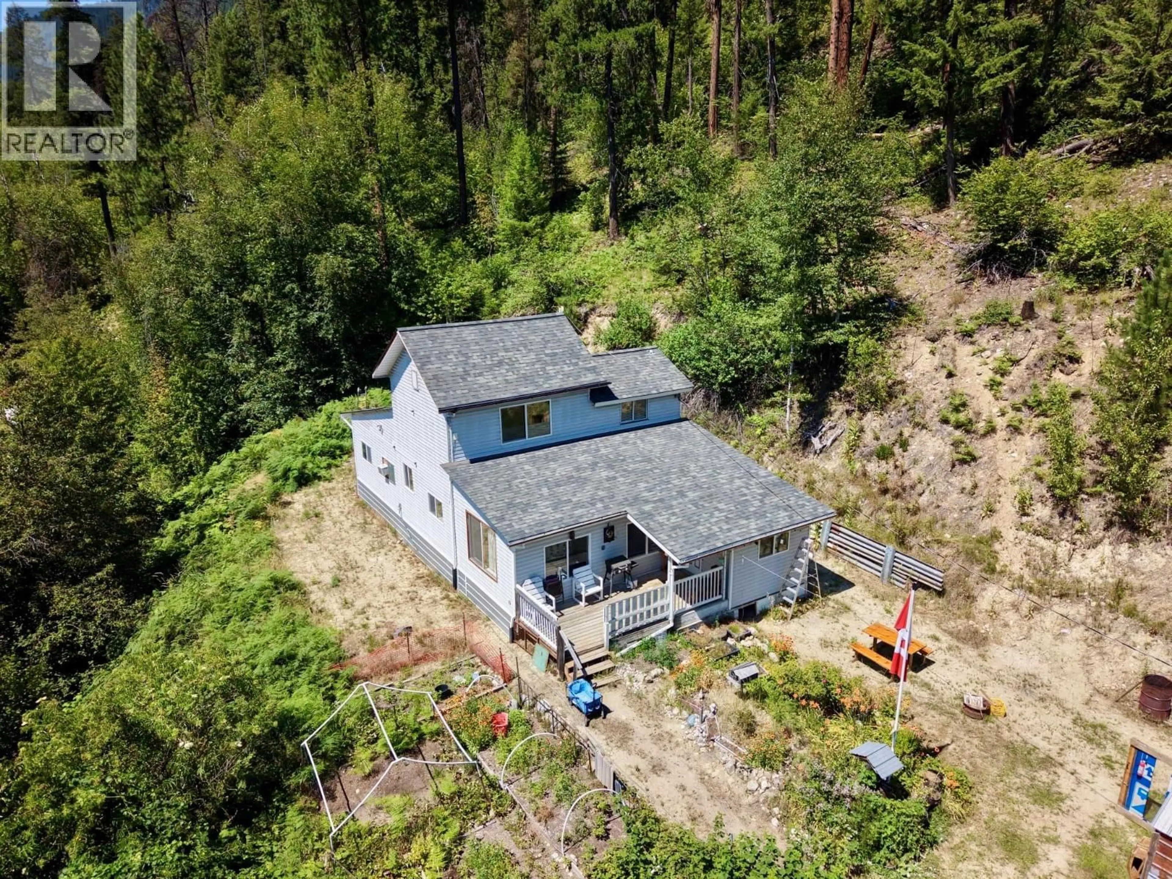 A pic from outside/outdoor area/front of a property/back of a property/a pic from drone, building for 175 GROHMAN CREEK ROAD, Nelson British Columbia V1L6T9