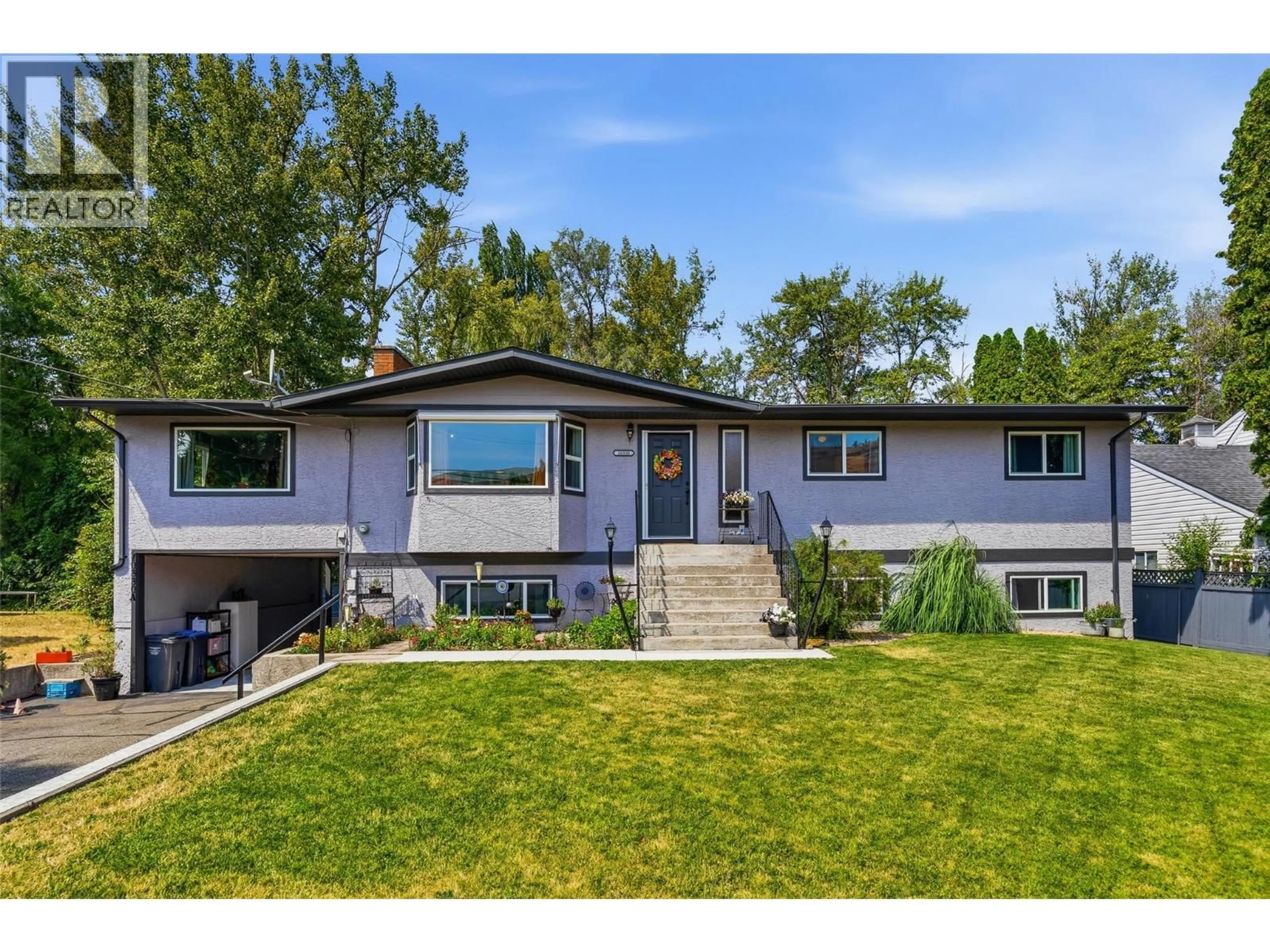 Home with vinyl exterior material, street for 10330 MEADOW ROAD, Lake Country British Columbia V1V1V6