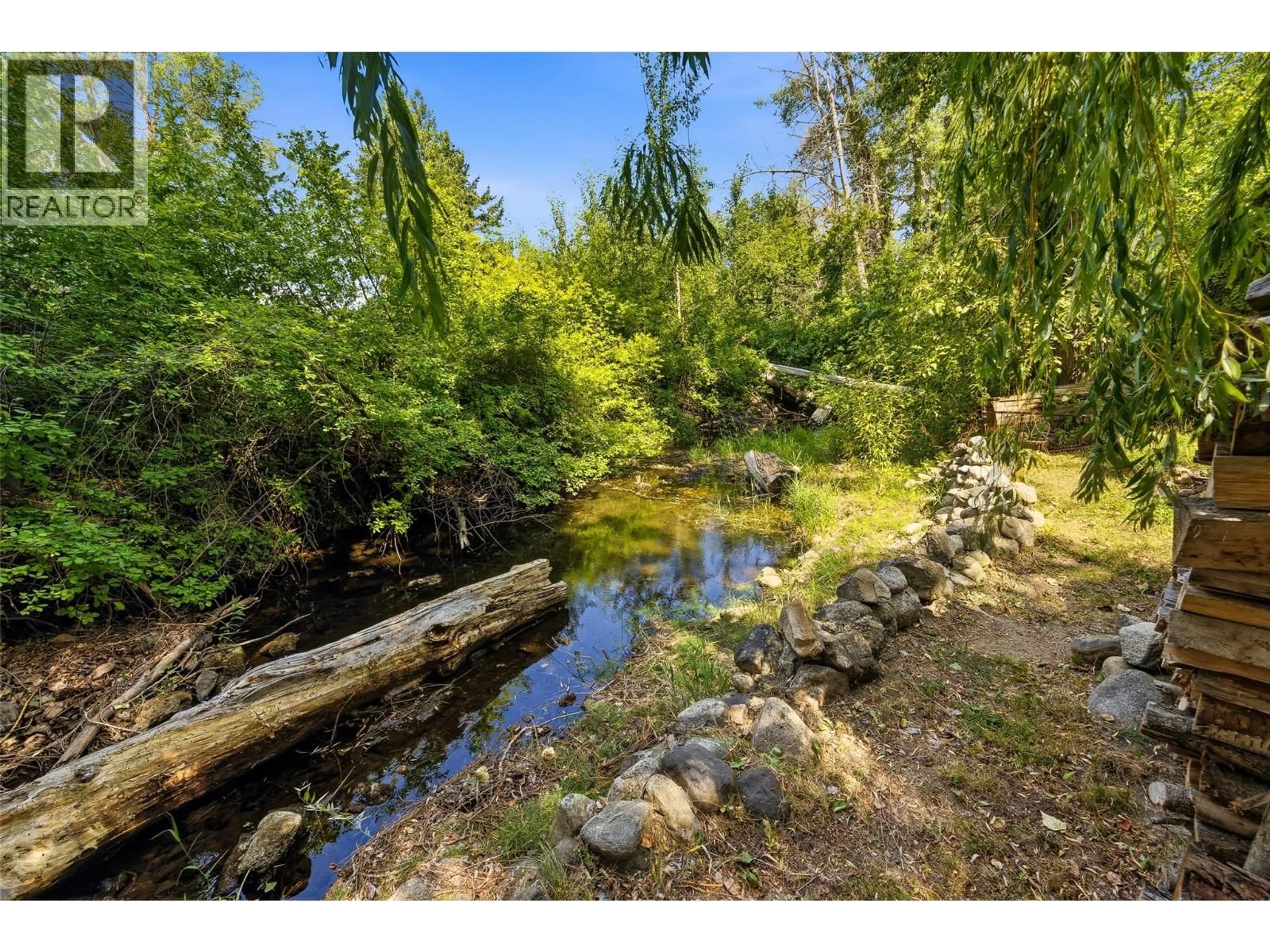 A pic from outside/outdoor area/front of a property/back of a property/a pic from drone, water/lake/river/ocean view for 10330 MEADOW ROAD, Lake Country British Columbia V1V1V6