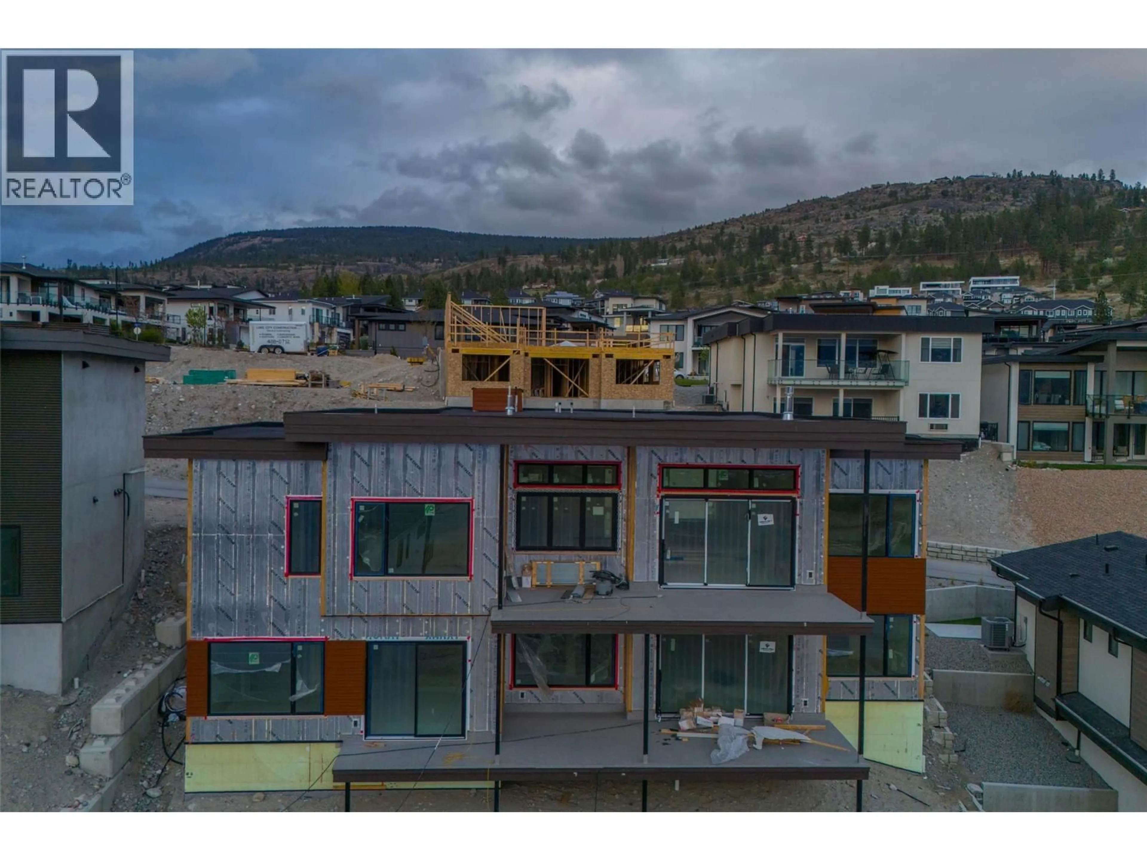 A pic from outside/outdoor area/front of a property/back of a property/a pic from drone, mountain view for 1096 ANTLER DRIVE, Penticton British Columbia V2A0C8