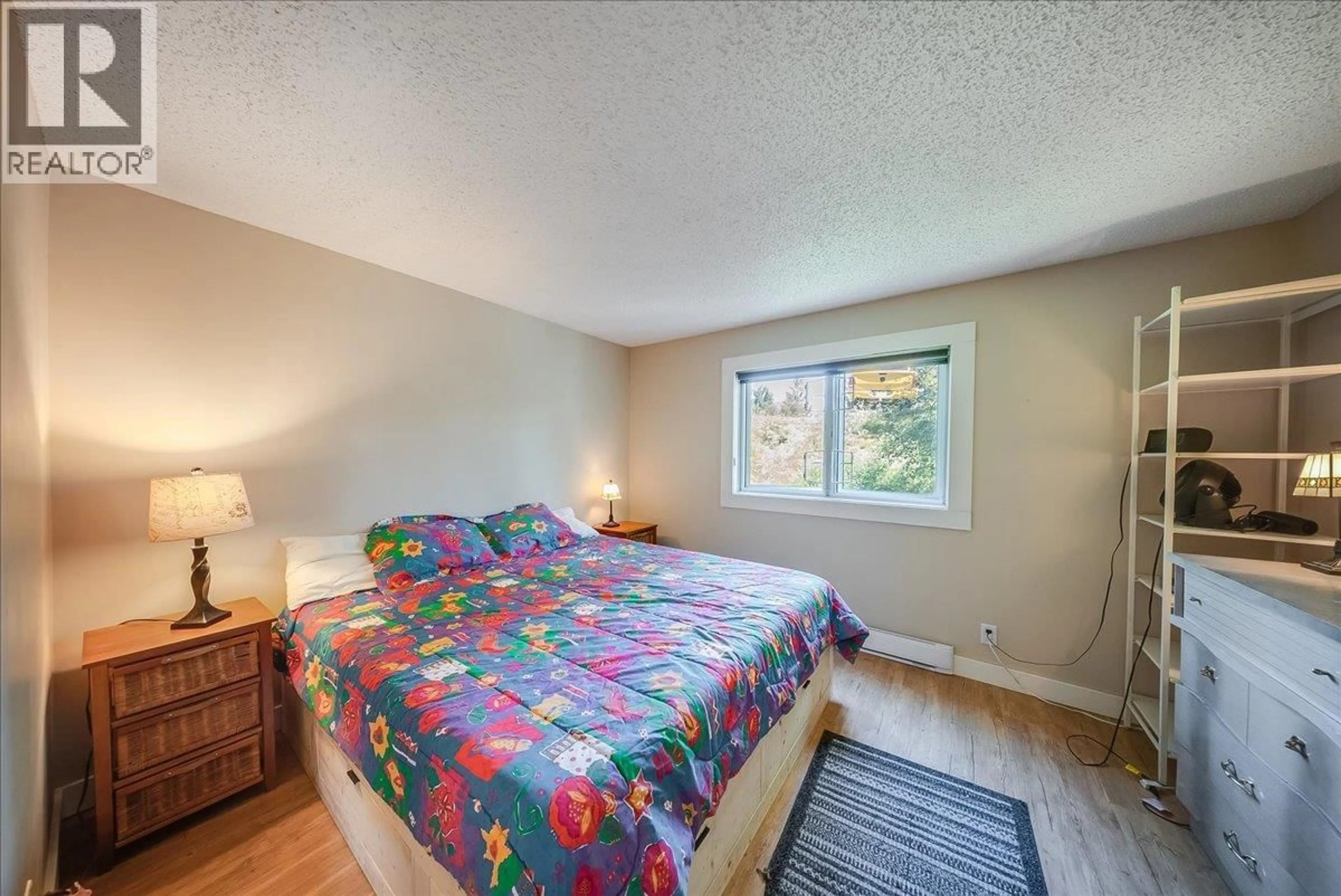 Bedroom with bed, unknown for 202 - 1510 NICKLEPLATE ROAD, Rossland British Columbia V0G1Y0